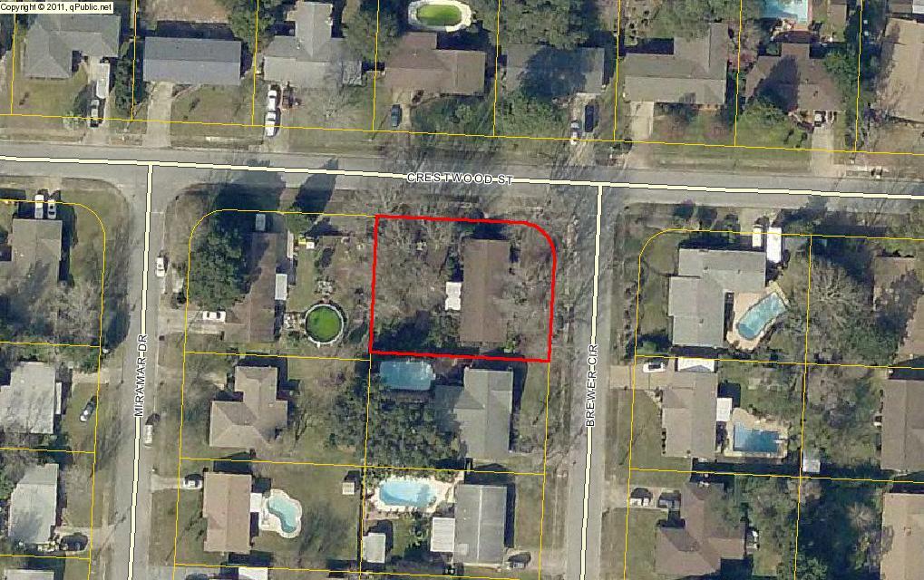Fixer upper with great potential and in a fantastic location! This home has all-brick siding, a side-entry garage, and a screen porch. Located just two blocks from schools and near shopping! Any sheds, outbuildings, and lawn pumps are being sold in ''as is'' condition and no value will be added. Buyer to verify room measurements.