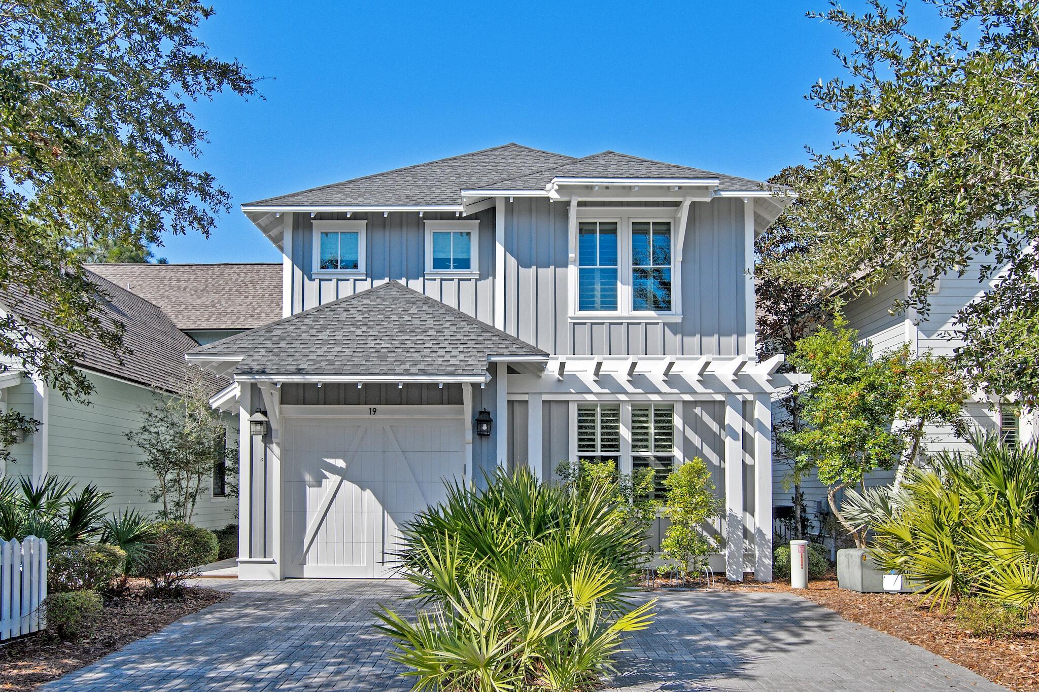 South of 30A in the gated community of Watersound West Beach is 19 Quarter Moon Lane. Tucked away on a private side street, this 4 BR, 2.5 BA home boasts a main level master bedroom with walk-in closet, mud room, powder room, large kitchen/dining/living area with center island, dry bar, and a screened porch with both a seating and dining area combined with a built-in grilling/entertainment area. Upstairs, you will find three well apportioned bedrooms along with a loft space ideal for a tv/office area. Exterior was repainted in 2017 and has new upper/lower HVAC systems and tankless water heater. Home comes fully furnished and beach ready with paddleboard, umbrellas, and chairs. DRB approved plans to add Bath and Office to 2nd Floor. Buyer to verify all information.