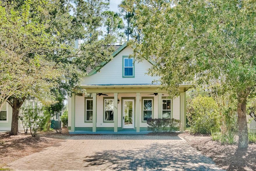 Beautiful 4-bedroom, 3.5-bath home in Harrison's Walk, a great community close to the beach. Incredible price for a generous home this close to the Gulf of Mexico! This home has great curb appeal with the covered front porch & paver stone driveway. Both the exterior and interior was freshly painted. Interior offers beautiful tile floors throughout the common areas, raised ceilings, and great natural light. Craftsmanship details like crown molding and white wainscoting give the property a beach cottage feel. This is a fantastic open floor plan with a ground floor master bedroom for added convenience and three guest bedrooms on the upper level. Great kitchen with chic wood cabinets, expansive granite countertops, and breakfast bar with custom lighting. All bathrooms feature granite as well!
