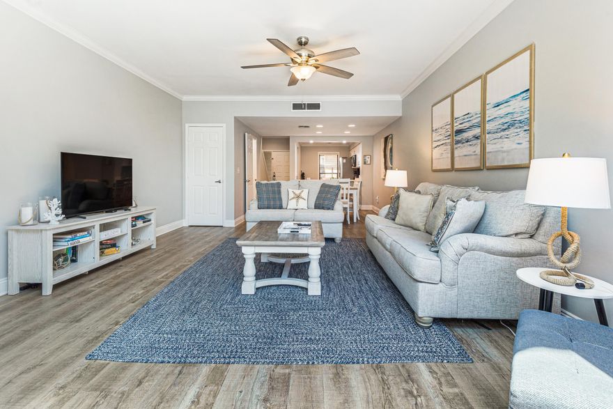New Roof - Lower Insurance! This townhome is a luxurious coastal retreat on a picturesque lake, located on the beach side in Sandestin resort. This stunning property features a beautifully remodeled kitchen adorned with the latest coastal design elements, exuding charm and elegance. All new appliances provide effortless meal prep. Durable and stylish luxury vinyl flooring throughout adds a touch of sophistication to every corner of living space. As you enter the light and airy living room you are greeted with a sense of openness and serenity. The spacious living area seamlessly transitions to a charming patio that overlooks the lake, offering a perfect setting for relaxation and entertainment. This seamless indoor-outdoor connection creates an inviting atmosphere for gatherings. Back inside, as you ascend the stairs, you will discover the spacious primary bedroom, with a king bed, overlooking the tranquil lake.  The connecting primary bath offers privacy. A guest room at the end of the hall also offers an ensuite bath. The exterior has just been freshly painted and a new roof will be installed soon. This rental ready unit attracts many guests each year. Owners and guests can enjoy the warm days lounging on the glistening beach and swimming in the waters of the Gulf of Mexico or the Beachwalk community pool located on the same street. Situated in the heart of Sandestin resort, residents can indulge in a plethora of amenities including tennis and pickle ball courts and 4 golf courses for the sports enthusiasts, exquisite dining options for culinary delights, and upscale shopping opportunities for the fashion-forward individuals.  Enjoy biking or taking a golf cart through the resort to your favorite spot!