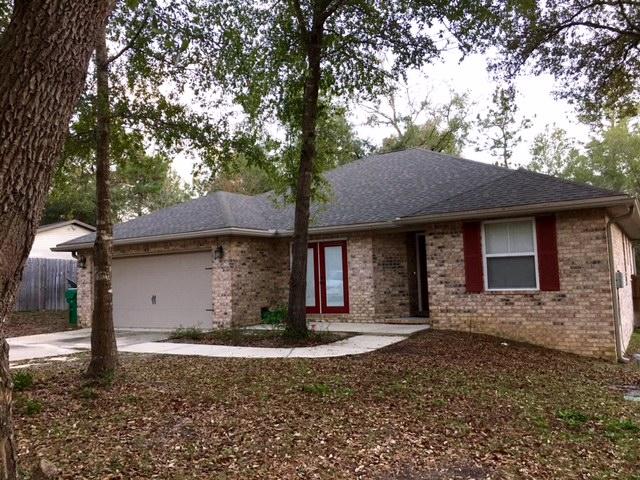 You don't want to miss this 4 bedroom, 2 bath home, south of I-10 with 2 car garage and opener, large living room with plant shelving, well equipped kitchen with an amazing refrigerator, breakfast bar, dining room, split bedroom plan with master bedroom and master bath having double vanity. Back patio and large fenced yard top off this like new home! Call today!