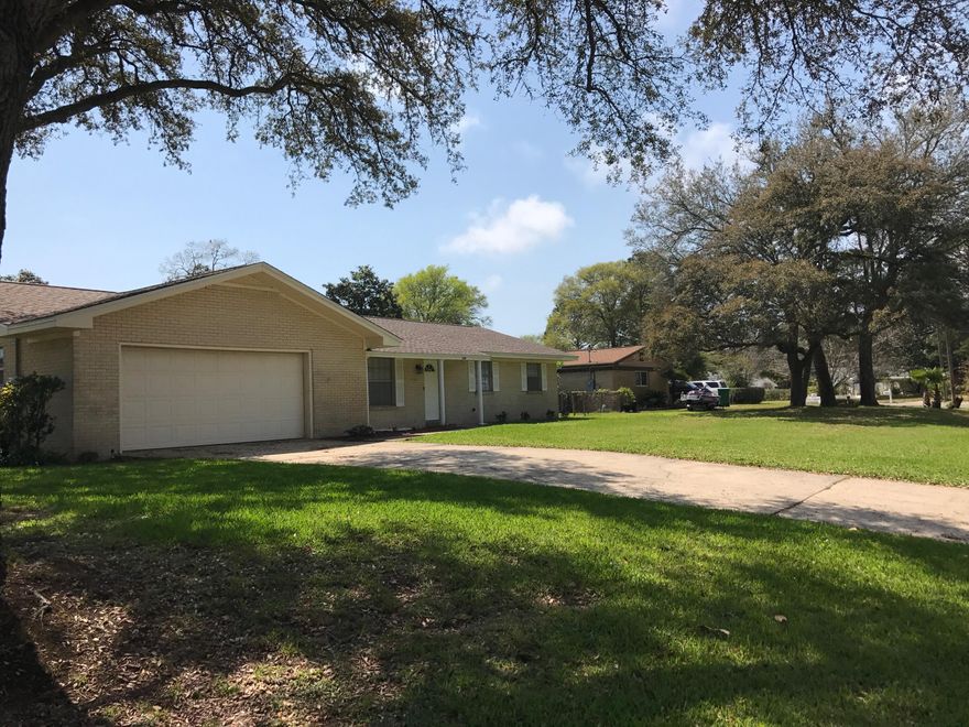 Beautifully renovated home on a large corner lot, with a fully fenced back yard. Great location, in a quiet neighborhood. New roof installed November 2016.Kitchen has granite counter tops and stainless steel appliances. All New flooring. Home has a living room and a family room with a wood burning fireplace.Large Two car garage, and plenty of parking. New Lawn pump