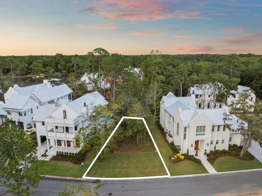 Situated near the heart of the Churchill Oaks community, Lot 82 offers a rare opportunity to build your custom home just steps from the neighborhood's premier amenities. This spacious homesite backs up to the scenic boardwalk that wraps around the neighborhood, offering peaceful views and easy access to nature right from your backyard. Located just a short stroll from the clubhouse, Lot 82 is ideally positioned for enjoying everything Churchill Oaks has to offer. The clubhouse features a resort-style pool, a state-of-the-art fitness center, and walking trails that meander through lush, landscaped grounds. Residents also enjoy access to a deep-water marina with private boat slips, paddleboard storage, and a fish cleaning station.

With its boardwalk setting and close proximity to the community hub, Lot 82 is a prime opportunity to create your ideal coastal retreat in one of Santa Rosa Beach's most prestigious neighborhoods.