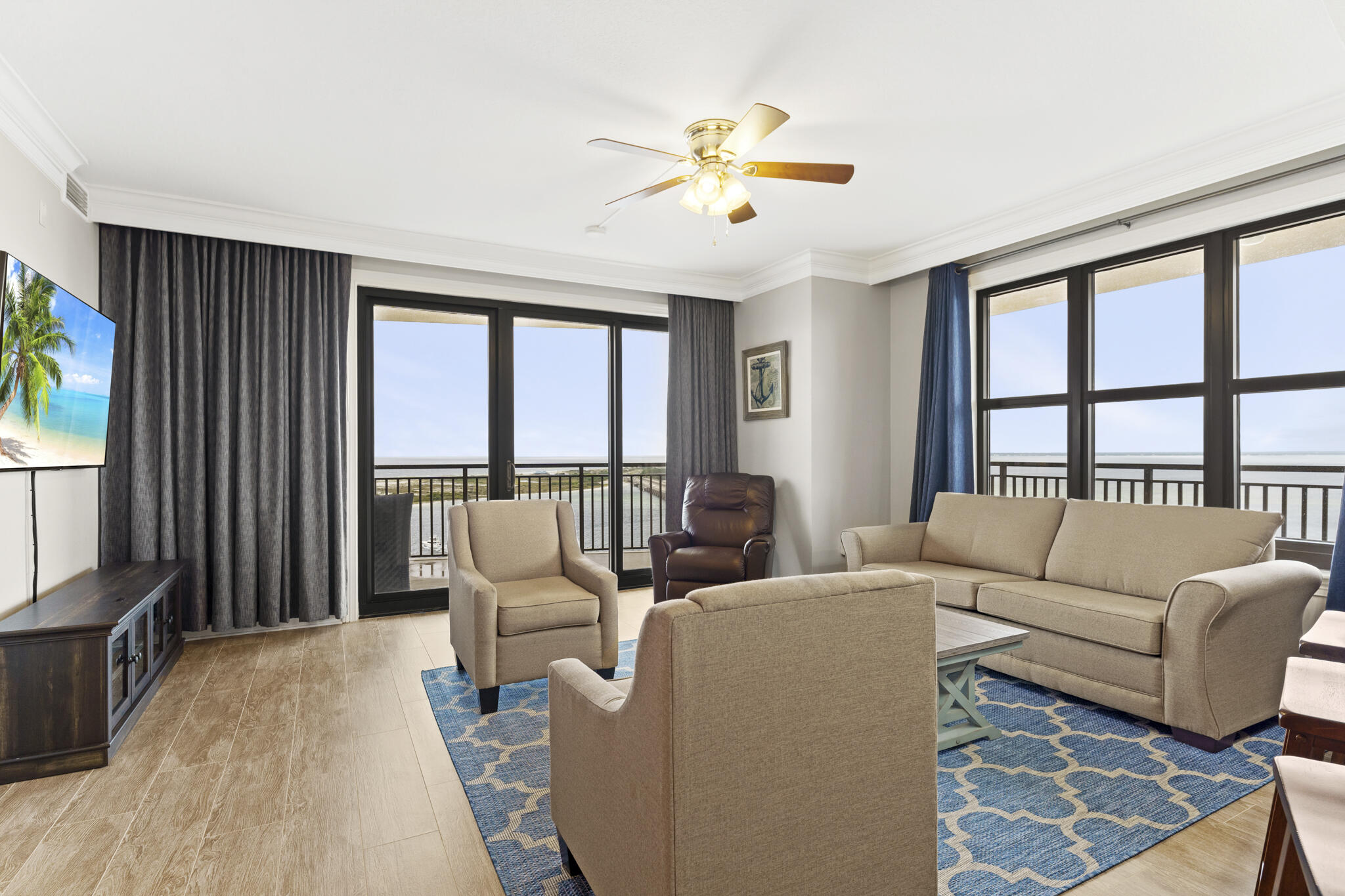 Located in the Emerald Grande resort above Harborwalk Village packed with restaurants, activities, night life, gulf front adventures and so much more. This beautiful furnished and UPDATED CONDO, features 4 bedrooms and 4 full bathrooms (master bedroom with a king bed, two guest bedrooms with a queen bed, fourth bedroom with a set of bunk beds and a queen pull-out sofa bed in the living room). Crown molding throughout. Kitchen includes stainless steel GE Profile appliances, granite countertop with bar and title floors. Many, many more fabulous features! This suite has a washer and dryer, living area, LCD TV's in all rooms and private balconies with panoramic views of the Gulf of Mexico, the Destin Harbor.  Amenities include activities for every member of the family; fine dining, fishing, boat and jet ski rentals, zip line, and much more right on property at Harborwalk Village!