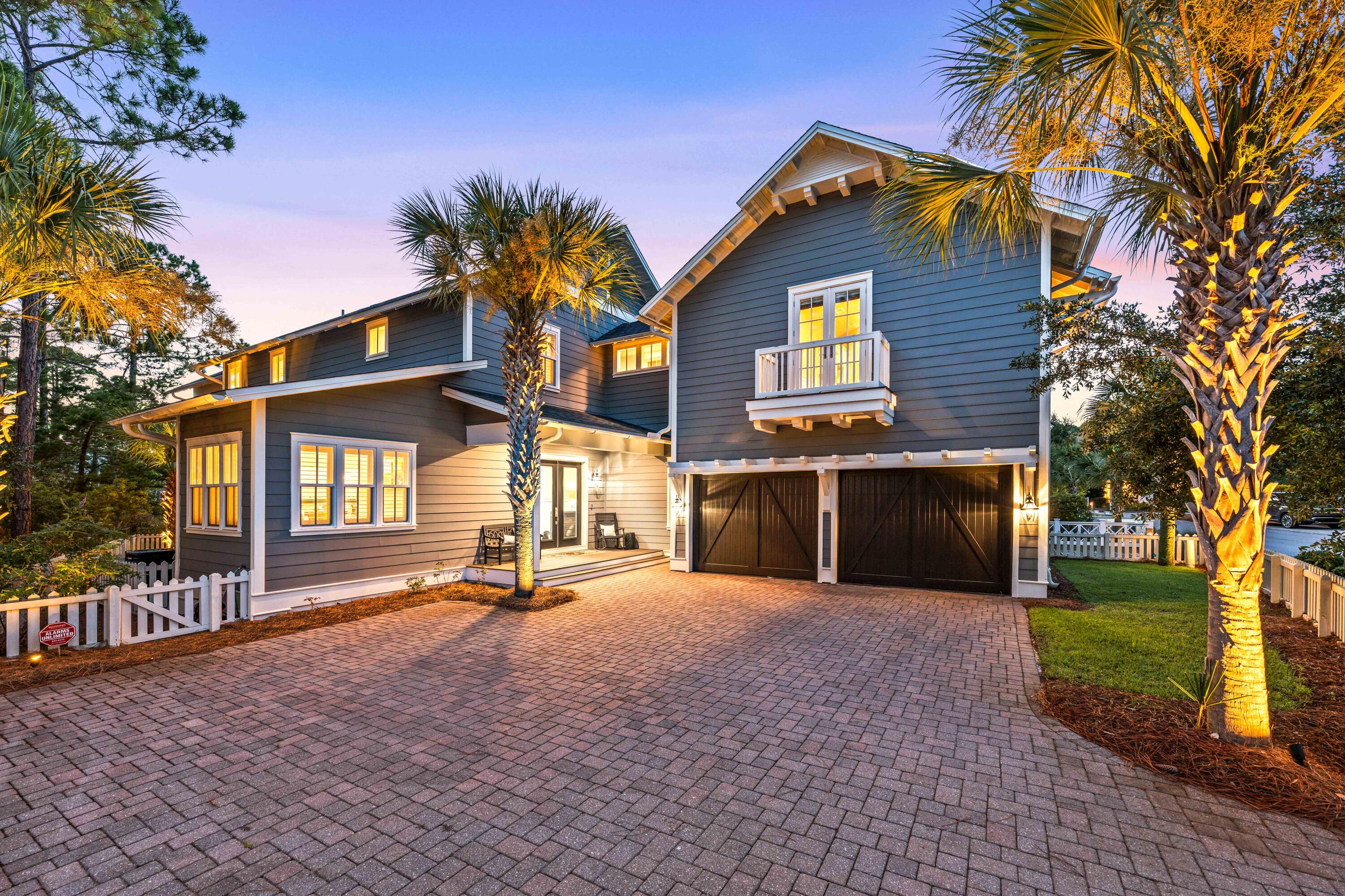 Enjoy the coastal life in the prestigious WaterSound West Beach community! This one owner 4BR/4.5BA lakefront residence boasts unparalleled luxury and comfort, perfect for those seeking a serene lifestyle along Scenic Highway 30A with deeded Gulf and beach access . Beautiful hardwood floors throughout, charming millwork including shiplap details and oversized crown molding enhance the coastal aesthetic and create a cozy, inviting atmosphere. The gourmet kitchen features stainless-steel appliances, granite countertops, a center island, large pantry with wine fridge and a custom breakfast table with banquet seating. Enjoy breathtaking lake views from two generous screened porches, offering the perfect blend of indoor and outdoor living. The first-floor screened porch is a haven haven for relaxation, featuring a cozy fireplace, a spacious sitting area, vented grill and a fully equipped bar with ample seating for effortless entertaining. The second-floor screened porch is your personal sanctuary, complete with a spacious sitting area and a soothing hot tub to unwind after a long day.
The main level primary bedroom has a stunning tray ceiling with wood beams and is a spacious and peaceful retreat with direct access to the screened porch. The luxurious ensuite includes a soaking tub and large shower plus a walk-in closet with custom cabinetry ensuring ultimate comfort and privacy. The second floor includes two additional guest bedrooms, each with its own ensuite bath and walk-in closet, providing a private and comfortable space for visitors. The fourth bedroom includes an ensuite bath and breakfast bar with beverage refrigerator, ice maker and sink and offers flexibility as an office, bedroom or second living area- the possibilities are endless. The second level also has a spacious open space off the stairs perfect for an additional living or bunk area.
The attached 2 car garage is an oversized 25 x 22 with 10' ceilings and plenty of storage room plus 10 x 8 hurricane resistant garage doors. A fenced area on the side of the house is the perfect spot for pets or a private garden.
Nestled between the Gulf of Mexico and the 2,000-acre protected sanctuary of Deer Lake State Park, WaterSound West Beach offers a rare sense of seclusion behind its gates with thoughtfully placed homes featuring striking, maritime-style architecture. Winding weathered boardwalks stretch through the dunes to the breathtaking shores of South Walton. Community amenities include several parks, a zero-entry swimming pool with grilling area and outdoor fireplace, a coastal dune lake, miles of boardwalks, and deeded beach access.