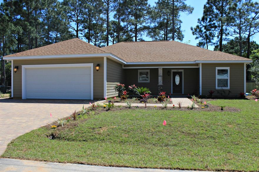 REDUCED!!! Beautiful Brand New Home built with high quality products. Pictures are of this same home built previously. Open and split floor plan. Its a must see. Has Upgraded Cabinets, Microwave/Hood vented to Outside, Granite Counters, Beautiful walk in shower, plenty of closet space. Recessed Can Lighting. Garage Floor is coated. Hardie Board Siding, New privacy fence in rear of home. Sprinkler System on its own well. Close to beaches, shopping, Sacred Heart Hospital. Newly paved road (old google maps show dirt road) Very hard to find in this price range with such quality. Builder warranty. Come see it today!