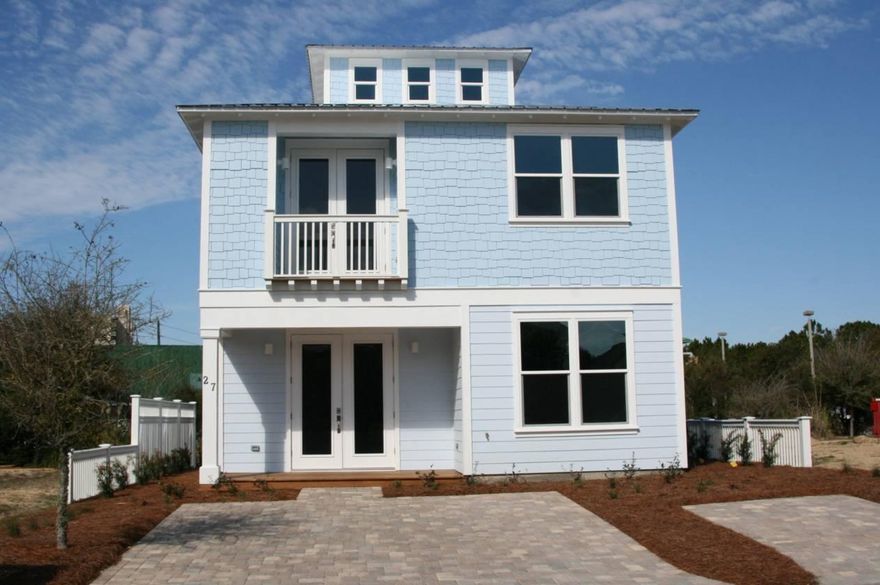 OVER $50,000 PROJECTED RENTAL INCOME FOR 2015.(see documents for more detail)This 3 story home is approximately 2021 sq.ft. with 3 bedrooms,3 full baths, sitting/media room and a 3rd floor tower/entertainment area.This home has been completely wired for Audio/Video on all floors, including outdoor speakers and includes a fully operational security system.The open floor plan offers the benefit of having a bedroom, full bath and laundry room on the first floor. Finishes include ceramic tile flooring in the common areas,wood cabinets, granite counter tops,and Bosch stainless steel appliances.The second floor includes the Owners Suite,with a private balcony,adjacent sitting/media room along with the 3rd bedroom and 3rd full bath.