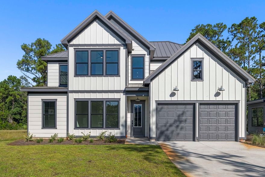 MOVE-IN READY !!! The Shoal - a peaceful neighborhood surrounded by natural beauty, this stunning residence features over 3,000 sq/ft of thoughtfully designed living space. Equipped with 5 spacious bedrooms and 4.5 elegant bathrooms, this home is ideal for families or those who love to entertain.  High-end finishes and designer touches are found throughout. Enjoy the serenity of a private wooded backyard. Come see this brand new, low maintenance, end of the cul-de-sac home in one of the most desirable locations of Santa Rosa Beach, Point Washington. Shopping, groceries, schools and the beach are near by. Welcome to The Shoal, a brand-new neighborhood where tranquility meets convenience. Nestled on the fringes of the expansive Point Washington State Park, this community boasts 30 thoughtfully designed homesites, each strategically laid out to provide residents with a sense of privacy and a connection to nature. The Shoal is conveniently located a short drive to Seaside, Grayton Beach and 30a. These spacious homes are designed to harmonize with the unique esthetics of the area boasting earthy tones, a community pond, and half of the lots backing up to state park. The Trenton floor plan offers 5 bedrooms and 4.5 baths with an open living concept downstairs and a spacious loft area upstairs.

This home comes with amazing standard features such as a metal roof, impact windows/doors, quartz countertops, LVP floors throughout all of the common areas/bedrooms, 8 ft doors, and a gas range and vented hood in the kitchen just to name a few! Homeowners have the ability to choose their finishes and upgrades at their design appointment. Other notable upgrade options would be a free-standing tub in the master bath and a sunroom option downstairs. **Prices may vary based on upgrades and lot selection.** Photos are not of this exact home. Renderings show potential exterior paint color options**