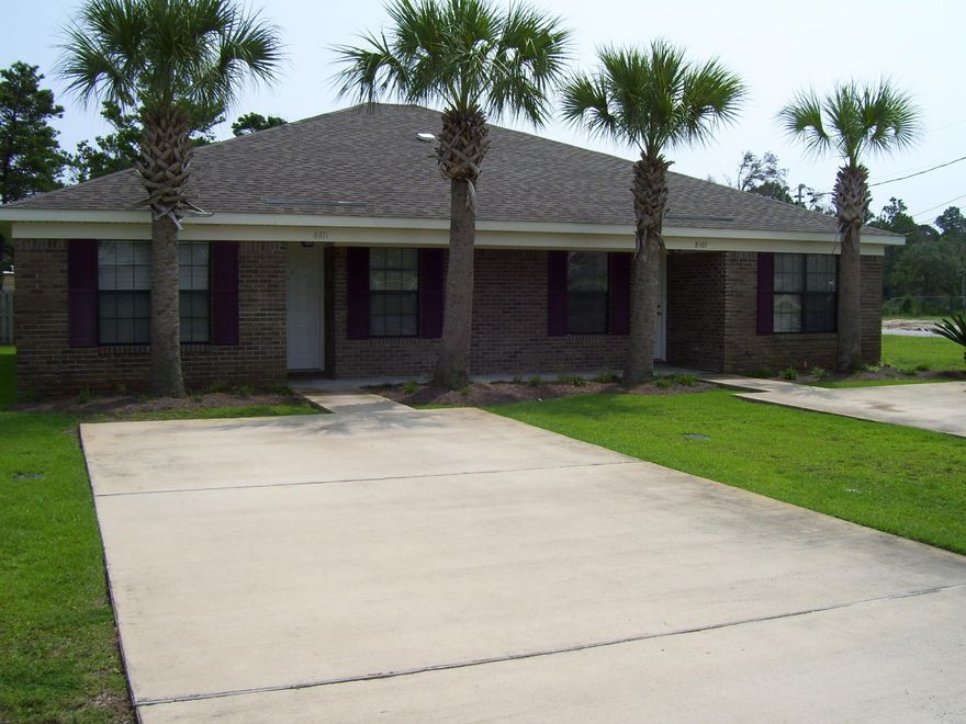 What a rare find in East Navarre. Property just built in 2002, all brick and corner lot. Two units each about 1115 square feet host 2 bedrooms and two baths with tile flooring through out. Covered back patio and small yard area makes this appealing for all. Storage closet off back patio.