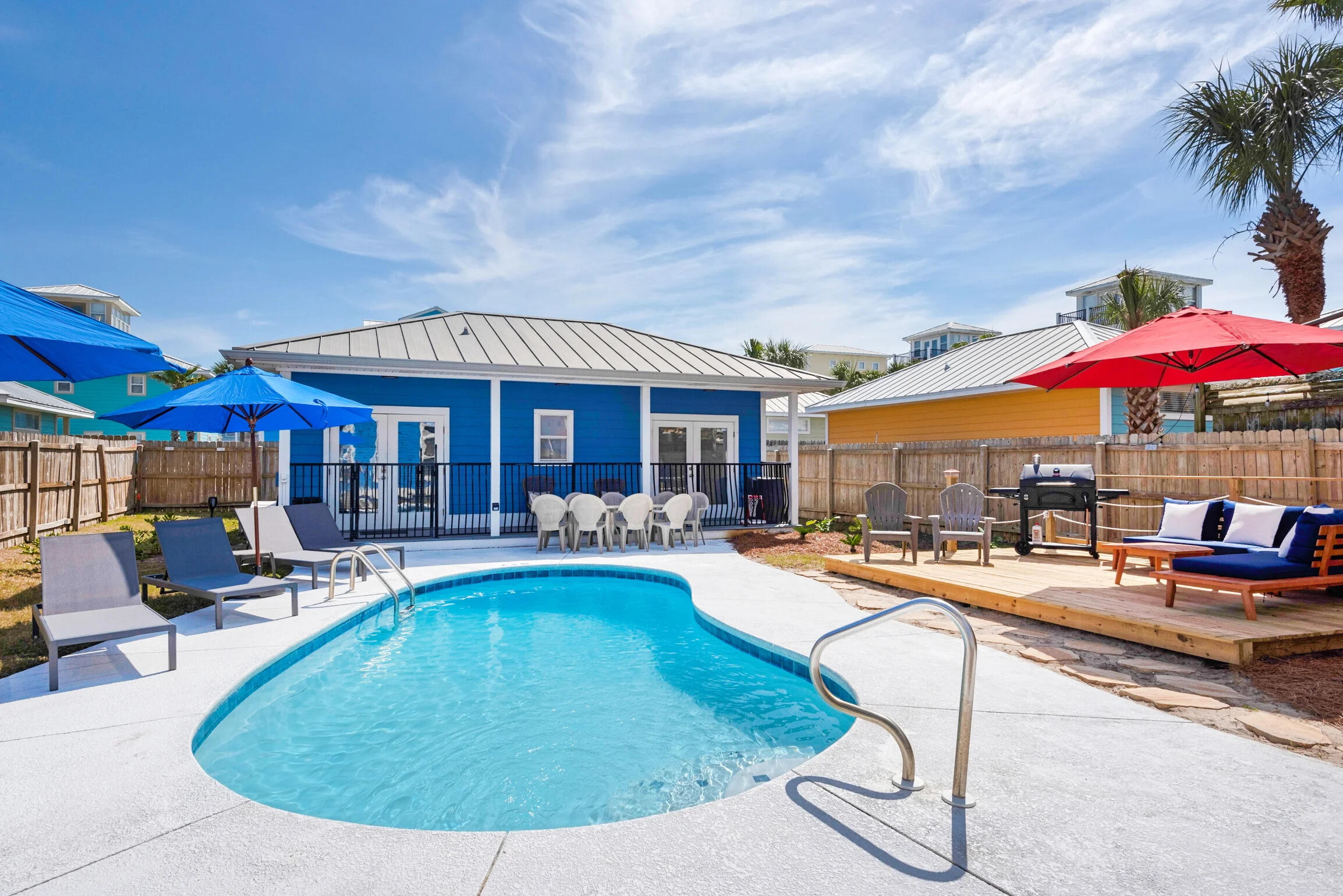 $20,000 closing cost credit to the buyer! Motivated Seller! Welcome to The Beach House of your Dreams. This spacious and stunning 3 story beach home features both modern amenities and architectural character in a fantastic beach community. 5 bedrooms + CARRIAGE HOUSE! Less than 1 block from the world's most beautiful beaches. Your friends, family and vacationing guests will enjoy incredible gulf views from multiple private balconies, a heated pool w/ spanning wood pool deck, and being in the HEART of Destin! A short-term rental machine boasting a phenomenal rental history - this is the one you've waited for! This 3 story beach home sleeps 18, and hosts multiple living areas. The backyard oasis is the perfect location for friends and family to gather.