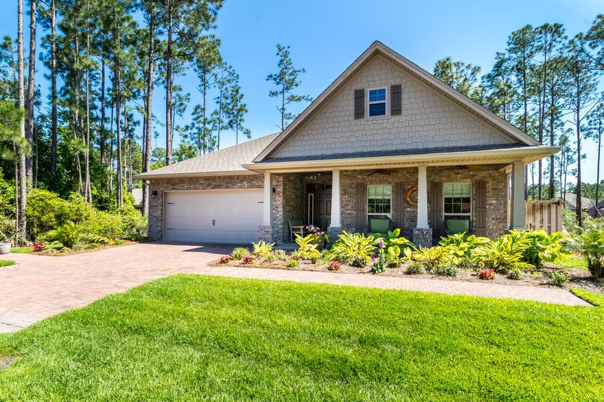 Call to see this beautiful one story brick home - short notice is okay! Far beyond builder standards with wood flooring (no carpet), custom gutters, lawn and garden irrigation, privacy fenced yard, paver patio and sidewalk, extra crown molding and a paneled 2 car garage ! The spacious, open floor plan offers a terrific layout for daily living and entertaining. Warm yet neutral, the kitchen with off white cabinetry, tile backsplash, granite counters, and stainless appliances flows naturally to the family room and dining area. A large master suite with walk in shower and walk in closet features a bright sitting area and direct access to the covered, screened porch. Convenient location to schools, boat ramps, beach and a short walk to N Eden pocket park on Choctawhatchee Bay.
