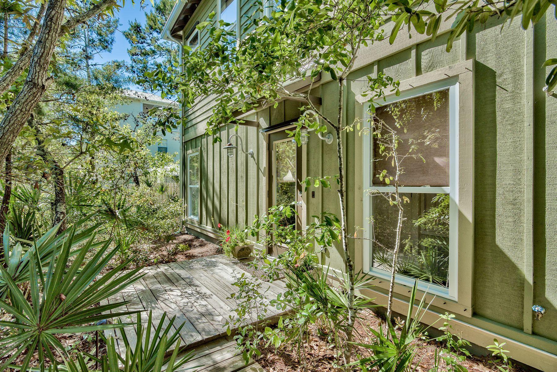 Living south of Scenic 30-A within a brief walk or bike ride to the Gulf is one of the most appealing attributes of this home. Strategically located near the Eastern Lake Inlet and the public access at the end of S. Gulf Drive, one will enjoy paddle boarding, water skiing, kayaks, canoes and fishing at it's finest! This custom built home has many features one would love to experience, especially it's wonderful privacy and awesome landscaping.The owners added a new Bosch Air Conditioner in June in addition to their new Kitchen Aid Dual Oven Range in the kitchen. This home is located to the back portion of Lot, so one could add additional rooms, a swimming pool, or build a carriage house if wanting to expand.