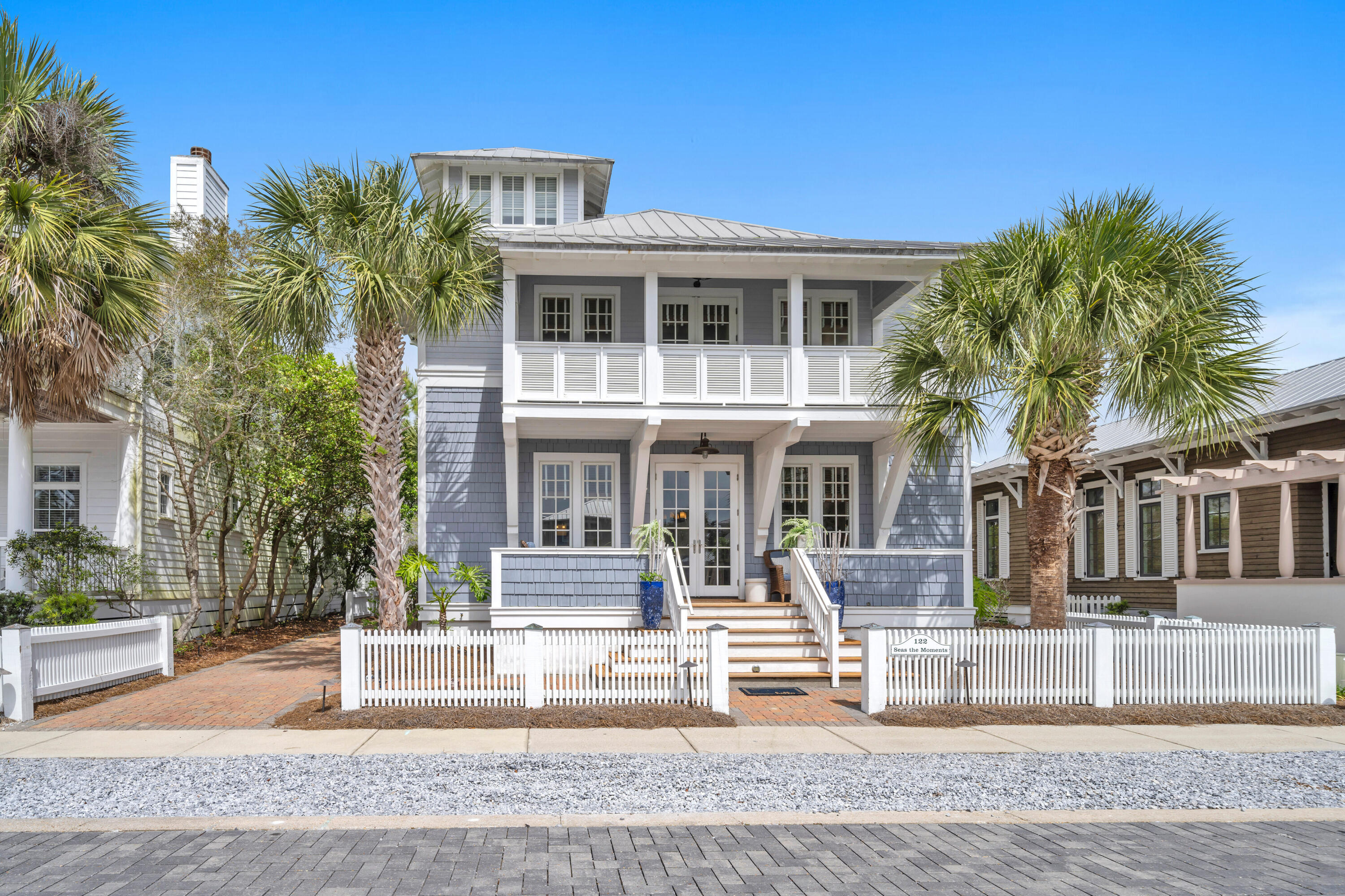 This lovely Nantucket style beach home, situated in the heart of Carillon Beach, is a mere 1-2 minute stroll to the beach walkover and to the year 'round heated community pool, children's play area as well as tennis/pickleball courts. Featuring 4 BR and 3.5 baths PLUS BUNK ROOM, Seas the Moments offers the perfect setting for a memorable family vacation. This home, managed by Carillon Beach Rentals, achieved $117,245 in nightly rent revenue for 2024 and has $106,082 booking revenue for 2025 as of 6/18/2025. (Buyer must honor existing bookings through the end of high season). Offered for sale furnished. Boasting 3900 linear ft. of pristine re-nourished, never-crowded sugary sand beach, Carillon Beach is a quaint, private, strategically situated, secluded and gated community offering 3 community pools, two heated year-round, tennis court, pickle ball courts, children's play area, full court basketball area, meeting house and select shops and dining opportunities. The upscale shopping and restaurants of Rosemary Beach and 30AVENUE are but a 5 minute drive away. Carillon will never experience the heavy traffic associated with certain other high-end areas due to its being gated and buffered on the west by Lake Powell and the state park, allowing you to enjoy proximity to all of the many benefits of 30A with none of the burdens. Unlike several communities to the west, golf carts are permitted in Carillon. All lot, home, room dimensions are approximates and should be independently verified.