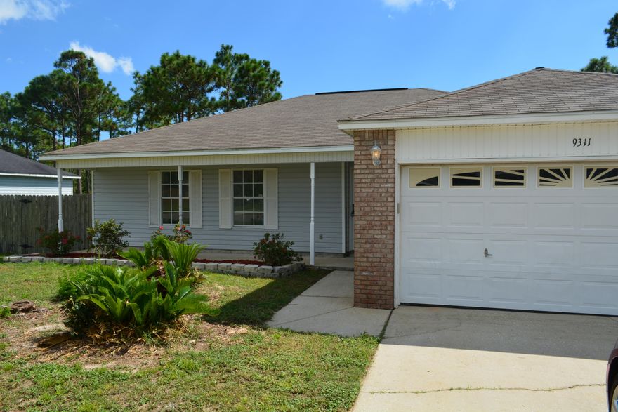 REO. Come see this home that is in move in ready condition with a brand new roof, freshly painted and with new flooring in all the bedrooms!! This home has tile in all living areas and the large kitchen offers plenty of cabinet space and a pantry. The adjacent dining and living room area has space enough to entertain the entire family! The master suite has a walk-in closet and private bath with new vanity, sink, light and mirror. Home is located on a 3/4 acre lot which is convenient to schools, YMCA center, shopping, Hurlburt AFB, and the beautiful beaches of the Emerald Coast!