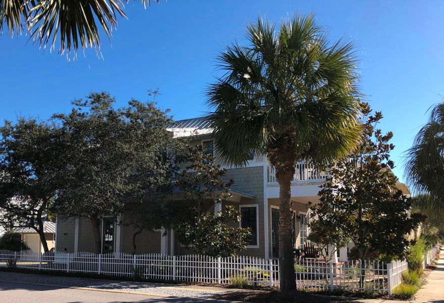 This beach house with 4 bedrooms plus bunk area is stunning and in an amazing location, just steps from beach walkover number two! The beautiful beach chic decor and furnishings have that timeless, classic feel that exudes beach-style living! There is also an open living, dining and kitchen area that is perfect for entertaining! Some of the incredible features include the enormous kitchen island with a granite counter top, stainless steel appliances, gorgeous slate floors and rich hardwoods, plantation shutters throughout, white linen drapes that cover the three sets of french doors in the living room, two master suites, double loaded porches, a side porch, back balcony and a yard building. This would be a perfect full time residence or rental ready vacation home!