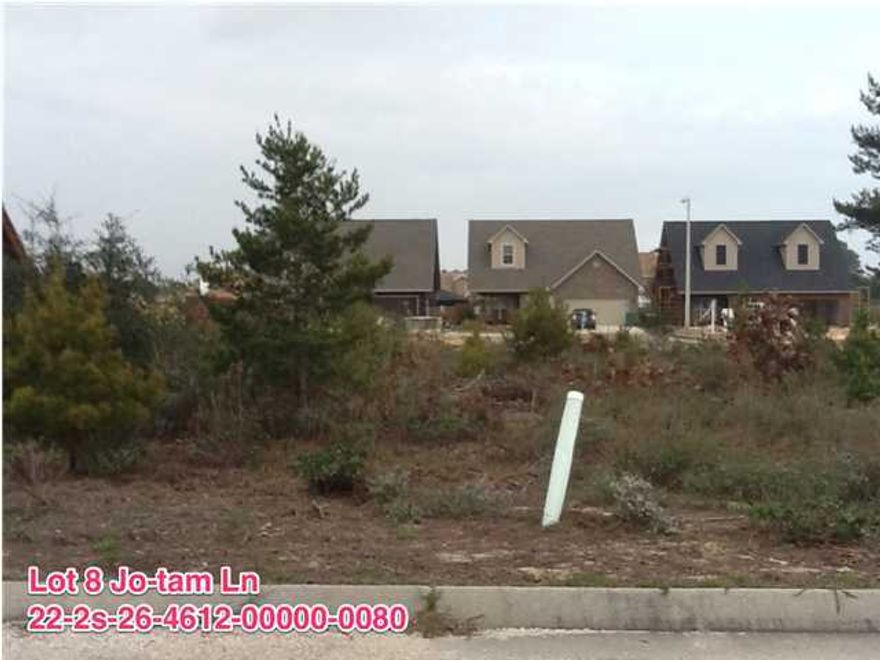 This beautiful level lot is located in Sandy Dunes Subdivision south of Hwy 98. Lot comes with deeded access to the sound, underground utilities. Public sewer and public water. Only minutes away from Navarre Beach and Navarre shopping. Great location with lots of new construction nearby. Seller may consider financing options in conjunction with homesite construction. Please call for details.