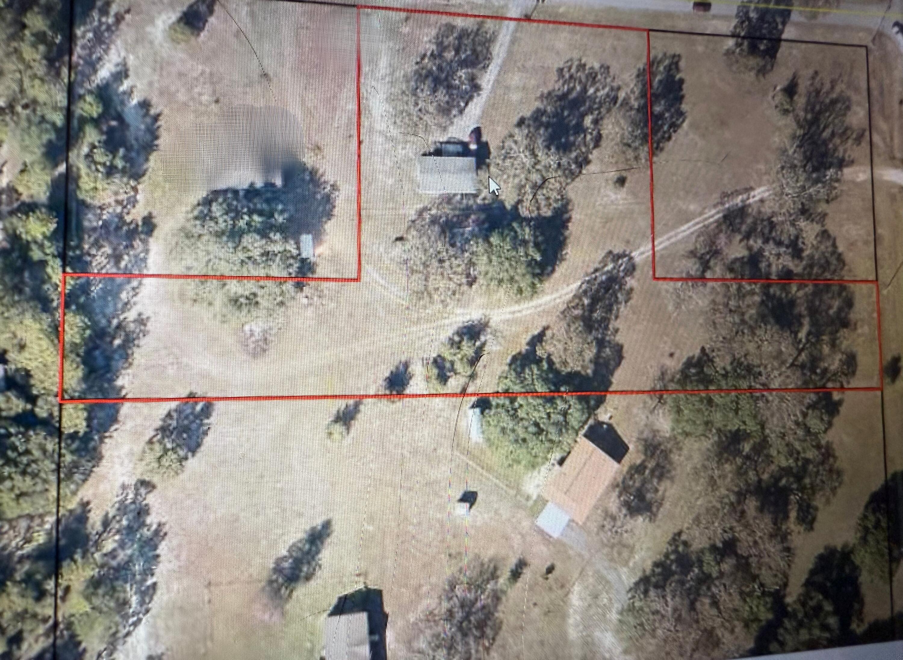 3 bed 2 bath mobile home. includes 2.53 acreage parcel # 23-4N-22-0000-0001-0600plus additional parcel #23-4N-22-0000-0001-060C. Total acreage 3.53 acreage.