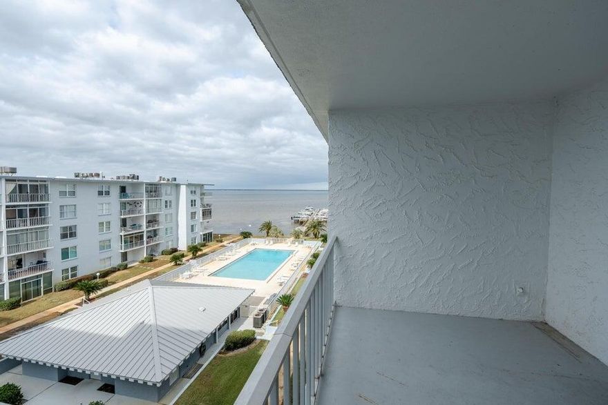 Don't miss out on this 2 bedroom, 2 bathroom unit on the desirable top floor with views overlooking the courtyard and Choctawhatchee Bay. This unit is unfurnished. The unit has 1 assigned parking space. Community amenities include a pool, community dock, picnic area, fishing station, assigned parking. There is laundry room is located on each floor Short term rentals under 6 months are not allowed.