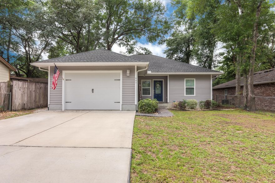 Stylish finishes complete this 3 bed, 2 bath home in central Niceville. With an open concept, this immaculate home invites comfort. Upgraded details were selected and quality crafted throughout the home: hardwood floors in the main area, GRANITE and STAINLESS STEEL appliances in the kitchen with a GAS stove, updated ceiling fans and can lighting, and thick baseboards. The master bedroom is spacious and the master bath features a double vanity and walk in tiled shower with glass door. Split bedroom plan with 2 bedrooms and a bathroom on the opposite side of the home. This bathroom is also upgraded with tile tub surround and granite vanity. The back yard is privacy fenced and the back patio features a built in sink and gas stub out for your grill. Call today for a private viewing.