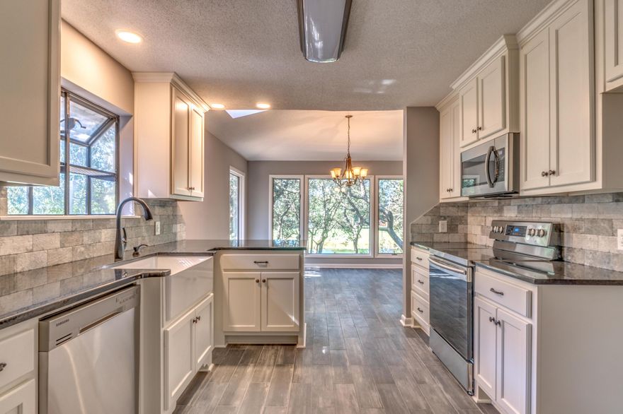 BEAUTIFUL LAKEFRONT HOME !! This incredible 3 Bedroom/3 Bath home with tons of upgrades is located on the 5th Hole of the Lake Course in the highly desired subdivision of Bluewater Bay, and is move in ready!! New Flooring, New Granite Counter Tops in Kitchen and All Bathrooms,, New Stainless Appliances, New Cabinets, New Light Fixtures, New Six Panel Doors. The Kitchen and Formal Dining Area have great views of the very private backyard and lake. The Custom Master Suite has incredible views and a large master bath with tons of closet space. Lots of natural light in all areas of the home. Home also has a Wet Bar and wood burning fireplace. Seller has also added a 3rd Bedroom and 3rd Full Bath. BWB Resort offers 27 holes of golf, tennis and marina. NO HOA FEES!! This home is a must see!