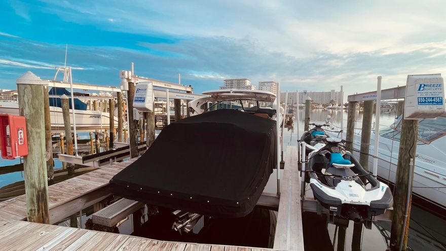 D-7 Boat slip is a 36 x 16 ft wt slip located in Marbella Yacht Club.  The slip has 24-thousand pound aluminum boat lift accommodating boat and jet skis.   Marina is managed by Marbella Yacht Club Owners Association.  Monthly Owners marina dues do not include electricity usage from shore power.  Buyer to verify all dimensions.  Buyer to pay 6% Florida Sales Tax Transfer Fee at closing. Wet Slip conveys via Assignment of Exclusive Right of Use.