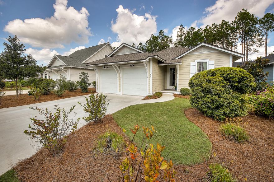 Elegant & refined living abound in this charming home in WaterSound Origins. The Anise floor plan offers 1,750 sq. ft. of luxurious living, with 3BR/2BA, a 2 car garage, 9' ceilings, hardwood flooring in living area, natural stone Travertine in bathroom, and granite countertops throughout. The kitchen offers stainless appliances with a gas range, center island & a large pantry. Other features of this home include screened porch, fenced backyard and superb landscaping. Community amenities include: access to the Village Commons Pool, Fitness Center and Lake Powell Dock; UNLIMITED golf with no green fees (cart fees apply) at the Origins Golf Course; and discounted food & beverage.