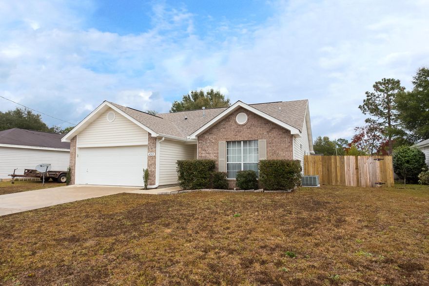 Back on market at no fault of seller's! Large flat lot with a spacious, split bedroom 3/2 house waiting to welcome you home! Laminate wood flooring leads you through the bright living room with sliding glass doors overlooking your large yard with storage shed on slab. Off of the kitchen you'll find your dining room and additional kitchenette space. Master bathroom boasts his and her walk-in closets and vanities. Flooring and paint updated in the last couple of years, brand new stainless steel appliances in kitchen, washer and dryer convey! Home warranty provided. Transferable termite bond just renewed in October. Buyer to verify all information deemed to be important.