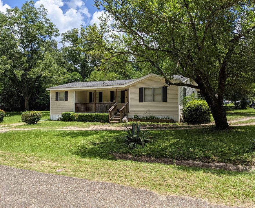 House is in great condition and has been remodeled with new roof and new water heater!   Newer stove and refrigerator. New addition to home approx. 100sq ft with washer/dryer hookups! Home sits on .17 acre with an additional .17 acre parcel directly behind totaling just over 1/3rd of an acre! This property is in the center of DeFuniak Springs which was voted ''Best Small Town'' in Florida in 2019 by MSN's Insider Online! Home is close to all restaurants, shopping and recreational activities which makes it perfect for 1st time homeowners, empty nesters looking to downsize and investors alike! Don't miss out on this opportunity!!