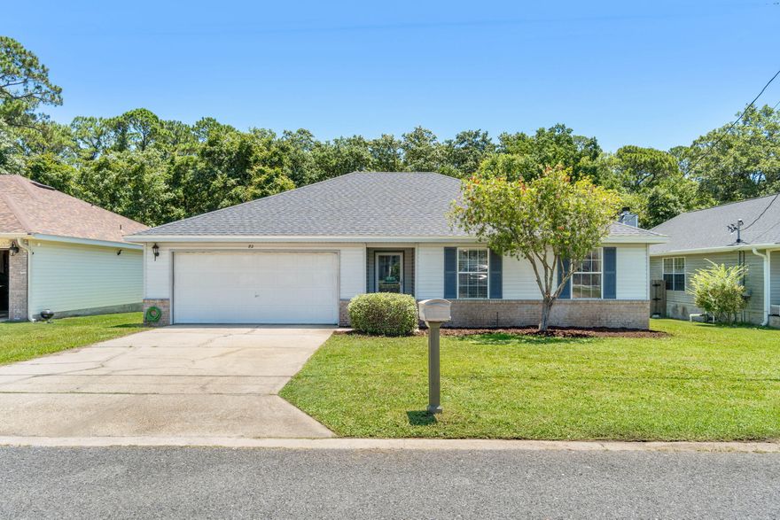 Conveniently located just 5 minutes to Hurlburt Field and with no HOA this would make a fantastic private residence, second home, or investment property! Don't miss out on this lovely 3 bedroom, 2 bath home updated with a new roof in 2019. Enjoy an open floor plan with hard surface flooring throughout all the common areas and a spacious living room with a vaulted ceiling - all freshly painted! The kitchen space is roomy with an eat in kitchen space, and it leads out the back door where you'll love relaxing and/or entertaining on the large back deck overlooking a private and fenced in backyard. Enjoy a great sized master bedroom with a walk-in closet, and the other two bedrooms are also nice sized with ample closet space. Both bathrooms feature updated and modern vanities you will love and