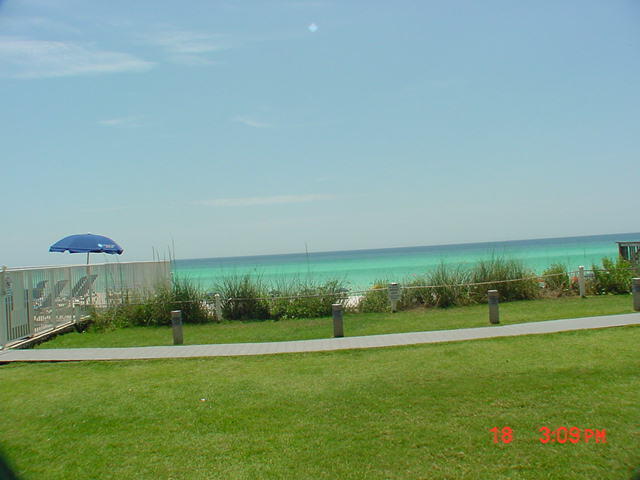 Beautiful 2 bd/2bath ground floor unit at the Beach House. This unit has been renovated and features white cabinets in the kitchen, granite countertops in kitchen and baths, full size washer/dryer, and tile throughout.  Walk out to the beach without having to wait for elevators. This low-rise building is a hidden gem on the Emerald Coast consisting of only 106 units on 650' of beach front. Great location-close to shopping, dining and all our beautiful areas has to offer! All dimensions to be verified by buyer.