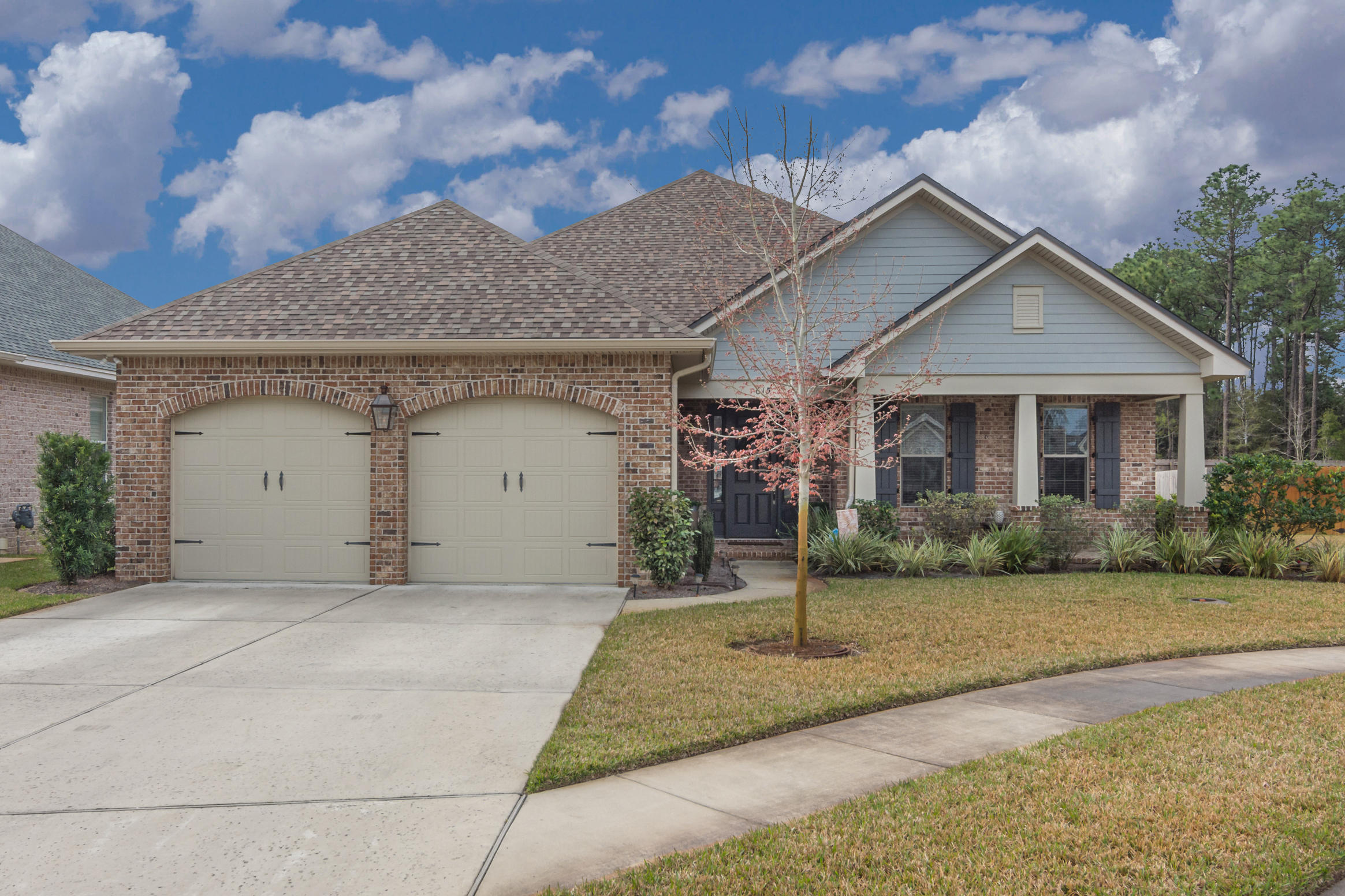 $25,000 PRICE DROP! Don't miss the incredible 3D Tour in Photos! Snap up this gorgeous, high quality 2017 built home in Central Niceville's desirable Magnolia Woods subdivision. Enjoy a prime lot location on a cul-de-sac with the added privacy of a retention pond directly behind. 9' and 10' ceilings and 8' doorways lend elegance to more than 2550 square feet of well-designed, open concept living space. Featuring one of Huff Homes' most popular floor plans, this 4 bedroom, 3 bath home boasts a designated office nook, separate laundry room, and screened back porch. Thoughtful upgrades to lighting, upper cabinetry in the office nook and laundry room, fully-outfitted Closetmaid master closet, and a generator transfer switch make this a must-have, turn-key home! Easy commute to Eglin,