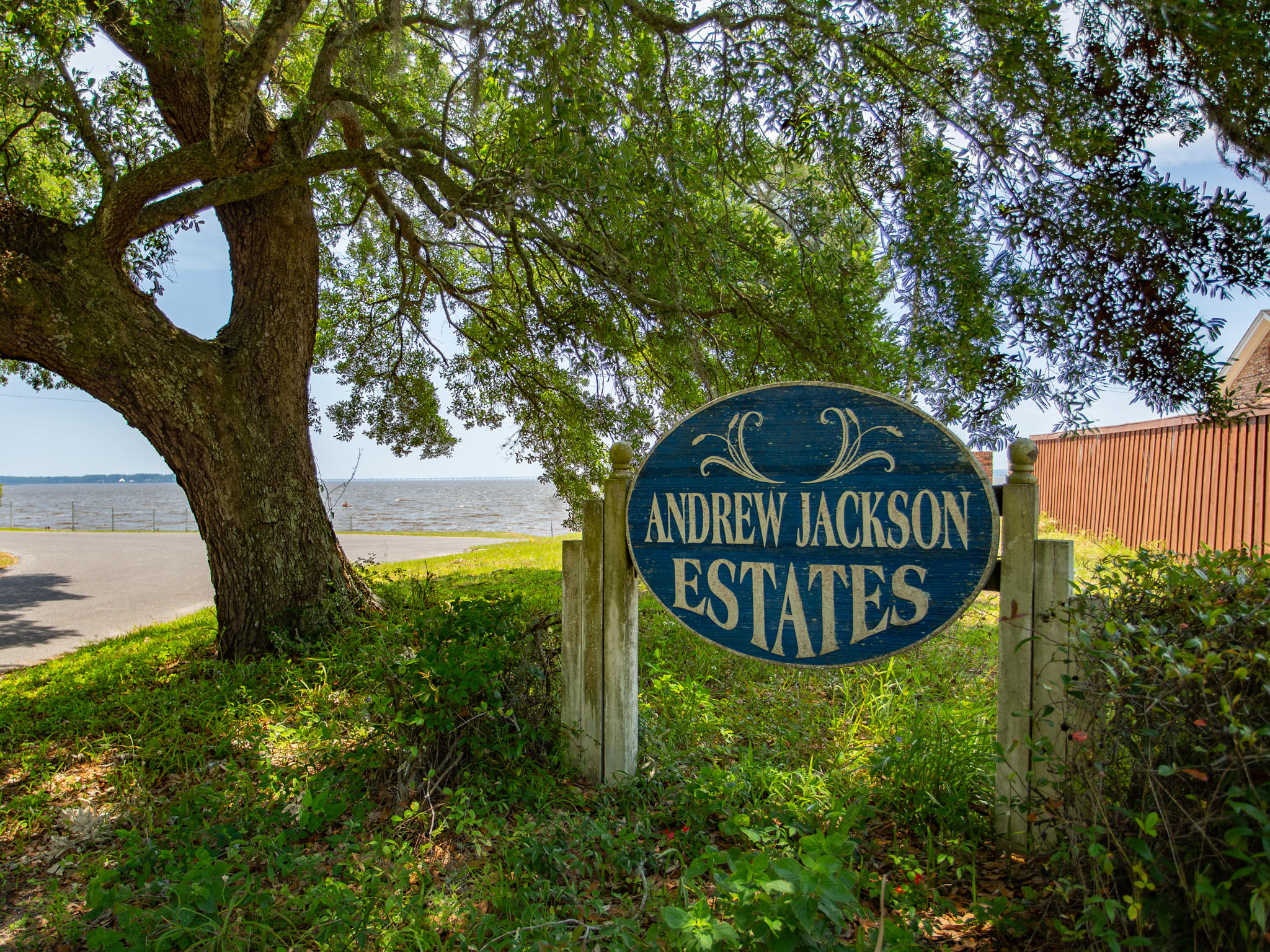 Flat, cleared lot with a spectacular view of Escambia Bay waiting for the home of your design. 95 ft of shoreline lined with rip rap & a wood seawall. Property has several mature palm trees creating the perfect waterfront oasis for your future dream home.Take a leisurely walk to Floridatown Park less than 3/4 mile from home or launch your boat & enjoy a day on the water.This lot is ready for you and your home. Situated in flood zones AE and VE.