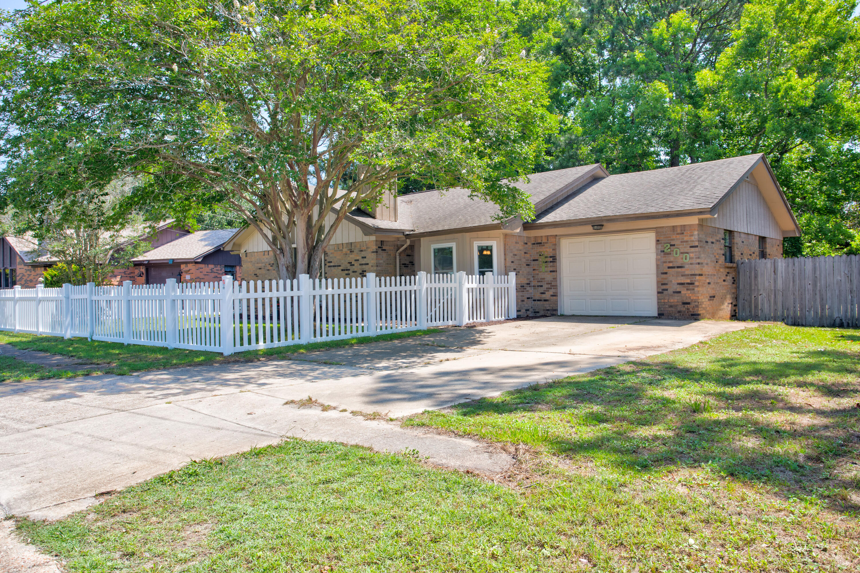 *UC w/Kick Out* **SELLER OFFERING $5,500 TOWARDS CLOSING COSTS/RATE BUY DOWN** Welcome home! This charming 3-bedroom, 2-bathroom residence offers the perfect blend of comfort, style, and convenience. Nestled in a convenient and family-friendly neighborhood, this property boasts an open floor plan designed to cater to all your needs. Step inside to discover a spacious living area with lots of natural light, featuring tile floors and a cozy fireplace, perfect for relaxing evenings. The modern kitchen is equipped with stainless steel appliances, ample cabinetry, and a lovely dining room. The backyard is privacy fenced perfect for kids and pets alike and includes a lighted pergola perfect for entertaining and a yard building for your lawn equipment. Roof to be replaced with acceptable offer