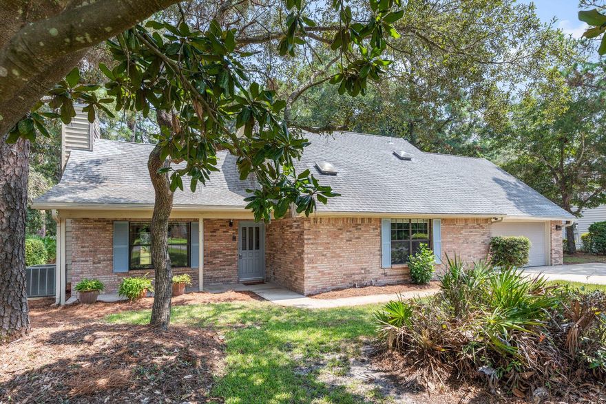 Settle into this charming 4bd/2.5ba home within the desirable Bluewater Bay community. Tall ceilings and a log burning fireplace add space and comfort to the inviting living area. Primary bedroom favorably located on the main floor extends to the primary bath which shows off the large garden tub and vanity. Upstairs is complete with three bedrooms and a full bath. Plenty of outdoor space for recreation, entertaining, or just enjoying the Florida sun await you in the lush landscape of this property!