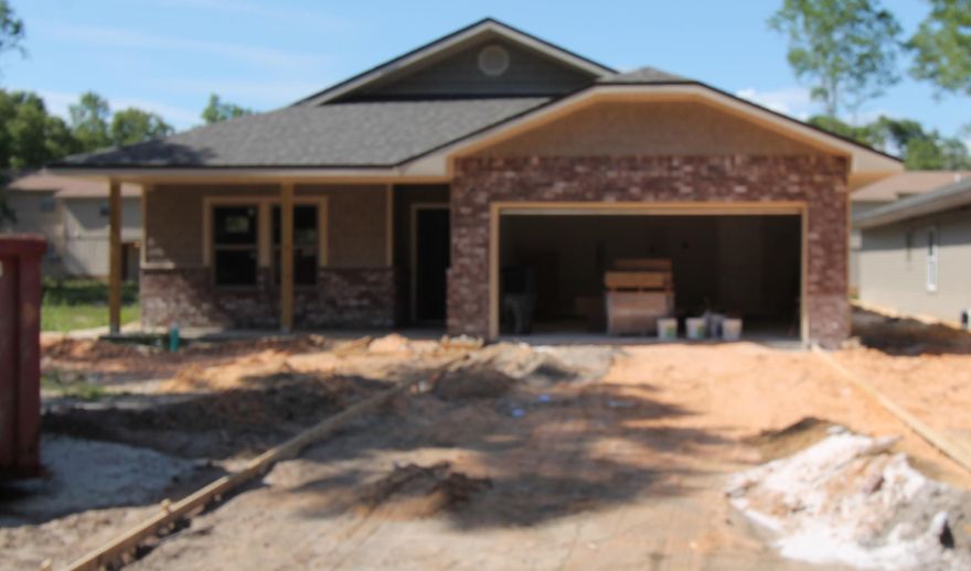 Awesome floor plan offered by 2018 Parade of Homes, winning builder! This 3/2 custom brick home has super curb appeal, and is being constructed on deep lot. There are 10 Ft. Ceilings w/ impressive crown molding, tile flooring throughout the main living and wet areas, and 5 1/4'' baseboard, throughout. As you enter the home through the covered entry, bedrooms 1 and 2 are on your left. As you continue down the hallway, you will then enter the chef's delight kitchen which boasts custom painted cabinetry, granite countertops, a large pantry, and stainless appliances (including an oversized commercial grade frig./freezer).