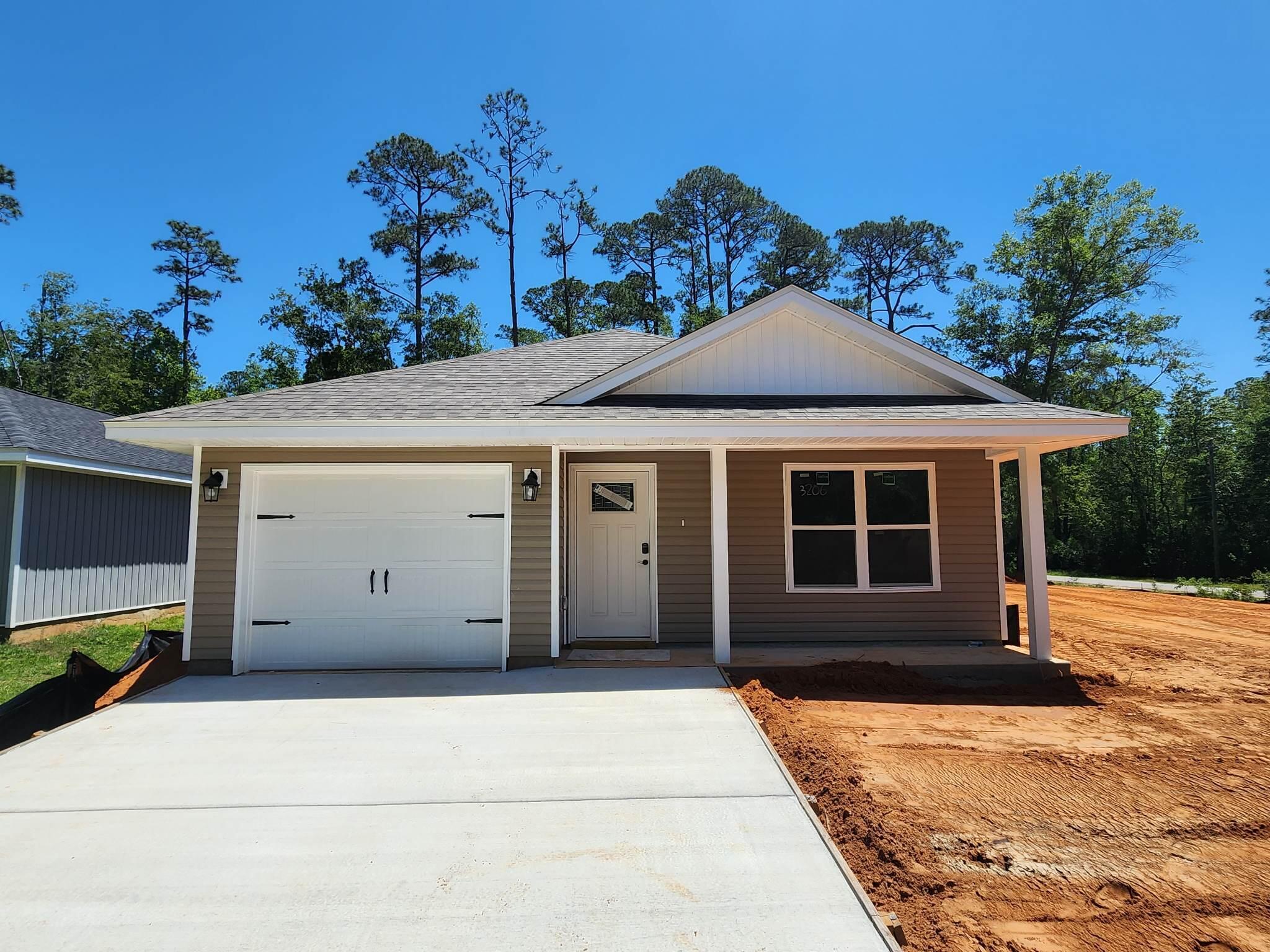 New Construction with exceptional quality! Craftsman 3 bedroom, 2 bathroom home has LVP flooring with carpet in the bedrooms, ceiling fans and an open concept. Kitchen has granite countertops, stainless and black stove and dishwasher, microwave and oven. Soft close cabinets and breakfast bar overlooking the living room. Primary bedroom has a pocket door leading into the bathroom with a walk-in closet, double vanity, granite countertops, shower. Additional bedrooms with ample space and an additional full guest bathroom. The back door opens to a covered patio. The yard will have full sod. The extra wide driveway allows for ample parking. **estimated completion 5/12**