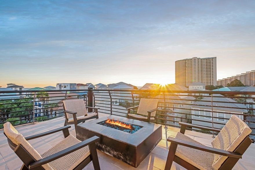 Luxury Meets Leisure in This Gulf-Side Retreat - Just five homes from the sugar-white sands of the Emerald Coast, this stylish four-story resort style beach house is the ultimate coastal getaway. Completed in 2021 on a premium 50' x 200' lot, it blends resort-style amenities with thoughtful design, making it a top-tier vacation home or rental investment with projected gross revenue of $240,000 annually.Enjoy breathtaking Gulf views from the rooftop terrace--your private sky lounge for sunset cocktails and starry night gatherings. A heated pool, outdoor kitchen with Lynx grill, gazebo bar, and concrete fire bowls turn the tropical backyard into a personal paradise, perfect for entertaining or unwinding. Inside, this expansive retreat features nine bedrooms, including two custom bunk rooms, and three separate living areas, offering room for everyone to spread out and relax. High-end finishes like a Brunswick pool table, a media room with wet bar, and 8 full / 4 half spa-inspired bathrooms with soaking tubs and walk-in showers elevate the experience on every level.
The heart of the homeon the second flooris a chef's dream: a gourmet kitchen complete with a 48" Viking gas range, pot filler, dual dishwashers, quartz-wrapped island, and seating for 16+ across the island and oversized dining table. Colossal glass doors on the main level open to a seamless indoor-outdoor living area, perfect for poolside lounging or evening gatherings under the stars.
An elevator provides easy access to all four levels, including the spectacular rooftop terrace outfitted with another fire feature, built-in grill, wet bar, and 50" TVideal for catching the game with a Gulf breeze.
Located on the coveted south side of Scenic Highway 98, this thoughtfully designed home delivers the Florida lifestyle at its finest: luxurious, laid-back, and ready to impress.
