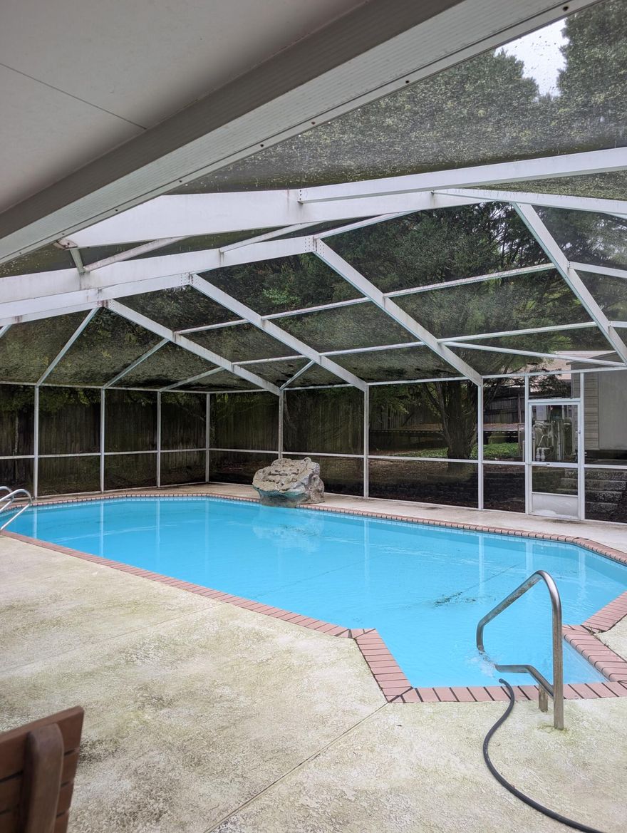 This is a  great CUSTOM BRICK RANCH ! SUPER convenient location with Screened in Salt Water Pool!  NEW roof in 2023!  Also, potential parking in back for up to a 27ft RV!  A place for all your toys!  The 3 Bedroom, 2 Bath split bedroom plan has a great feel!  There is a 12x 20 Florida Room for extra space to spread out!  The primary bedroom is a generous 17 x13 and easily fits a king bed!  Fenced yard helps with the little folks and pets.  There is updated granite counter tops and backsplash in the kitchen!  Come make this your HOME! New water heater and HVAC with acceptable contract.