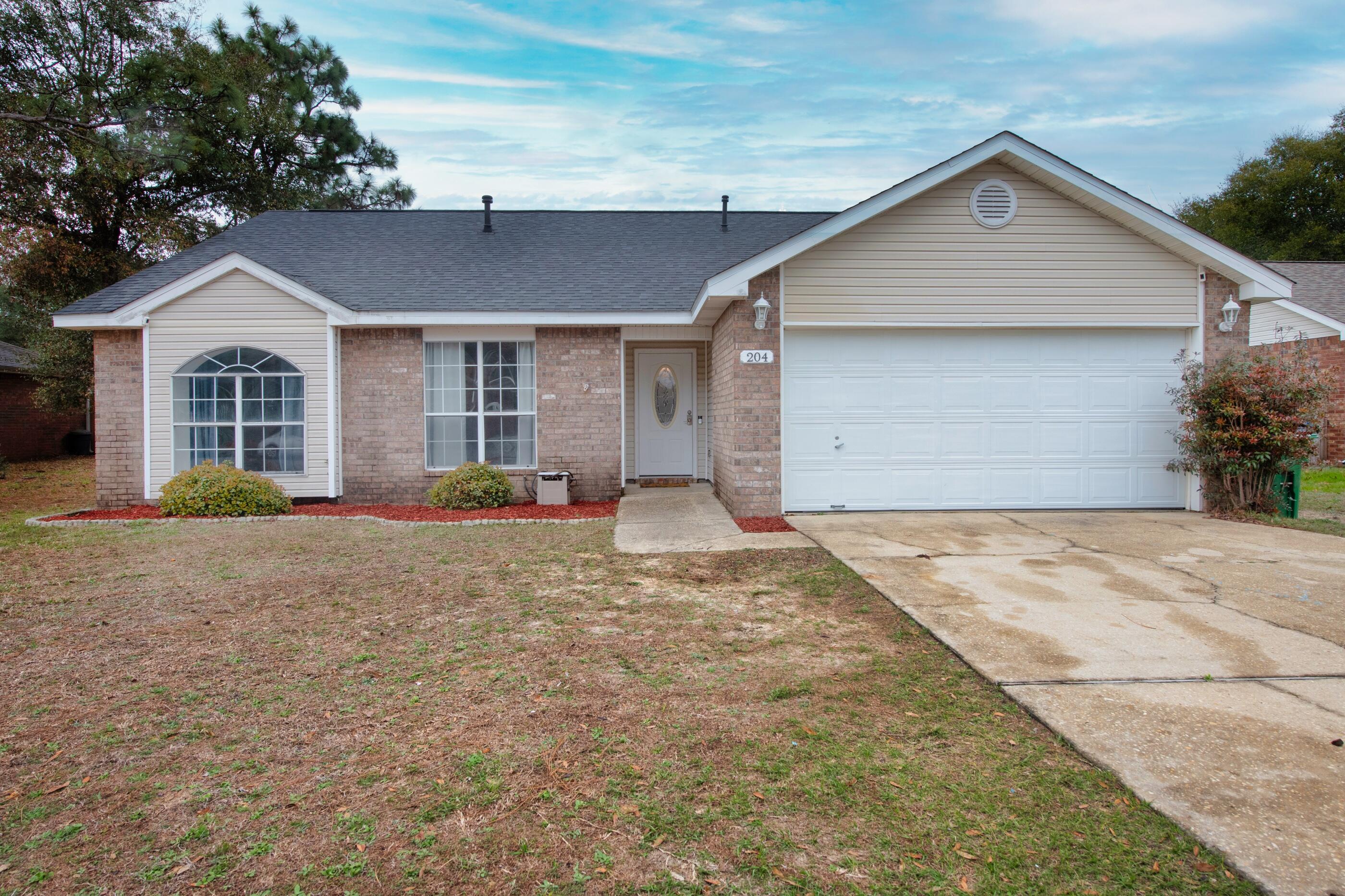 Charming 4 bed/ 2 bath in the heart of Crestview! Multiple large windows throughout this home allow for natural lighting. This home offers a spacious living room, as well as updated kitchen! This home also has a well sized fenced backyard. Schedule a showing today!