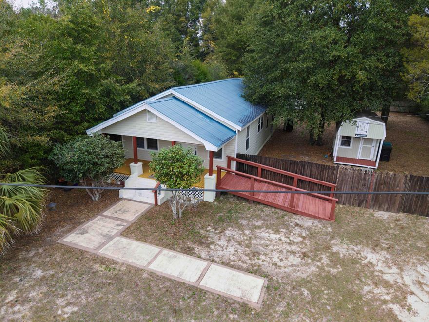 A $7,000 credit to the Buyer with acceptable offer. Experience the rich heritage and timeless charm of historic DeFuniak Springs--home to the iconic Lake DeFuniak, one of the world's only nearly perfectly circular natural lakes, the celebrated Chautauqua Winery, and a beautifully preserved downtown filled with culture, history, and small-town warmth.Just minutes from these local treasures, this inviting 3-bedroom, 2-bath 1920's Craftsman-style home offers both character and convenience. Fully renovated in 2017, it blends classic appeal with modern comfort, providing a cozy and private retreat.Nestled on a spacious lot, the yard is a true blank canvas--ideal for a garden oasis, outdoor living area, or expansion. And with C2 commercial zoning potential, the possibilities are wide open for residential living, a future business venture, or both. Three sheds available for additional storage options.

All of this and a leisurely drive to the beach, giving you the best of north Florida charm and coastal proximity.