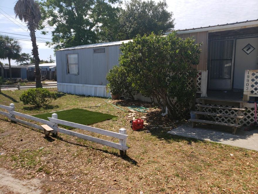 CORNER LOT ON THE SOUTH SIDE OF HWY 98 UNDER 100k! Don't miss your opportunity to own in the desirable Laguna Beach on the west end of Panama City Beach. This quaint corner lot is a short walk or golf cart ride to the World's Most Beautiful Beaches and offers great access to favorite local attractions and restaurants. On the lot sits a 2 bedroom, 1 bath mobile home that can be income producing for long term rentals, short term rentals or tear it down and rebuild your dream beach home. Cash deal only. All Information should be verified by buyer or buyers agent if important. Call today!