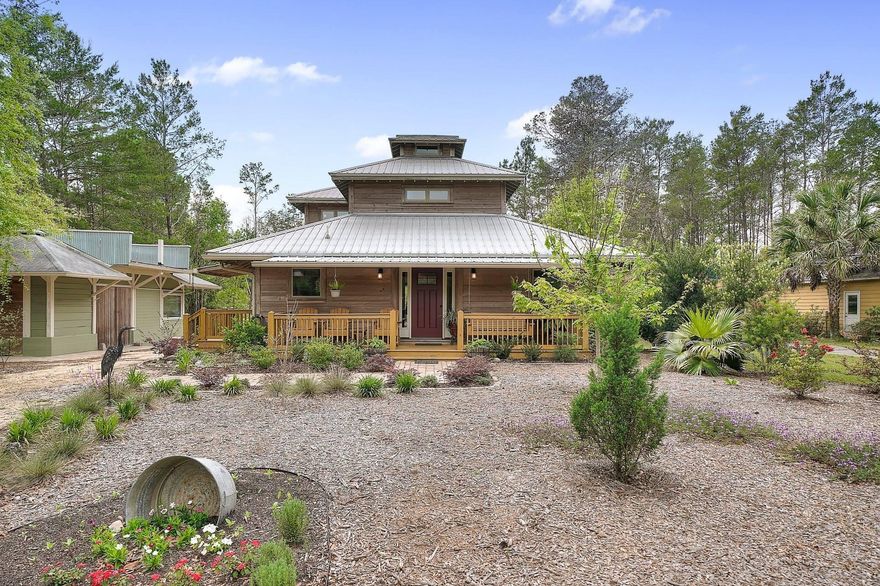 Welcome to this true ONE OF A KIND Creek side Cottage. Seller built it almost single-handedly from scratch, with CO emitted in 2017. No attention to detail was spared, with the home built on high quality original non engineered wood posts and beams. The home has two bedrooms, two bathrooms, including studio suit style upstairs master with it's own quaint reading area, and own balcony overlooking the woodlands, and nicely sized bedroom on 1st floor. Tile and wood floors welcome you thorough the whole home. First class carpentry and craftsmanship work is all around including customized dutch doors, soft close cabinets and drawers, cherry wood and solid surface counter tops, cypress walls and exterior, insulated metal roof, six car circular driveway, newly landscaped with