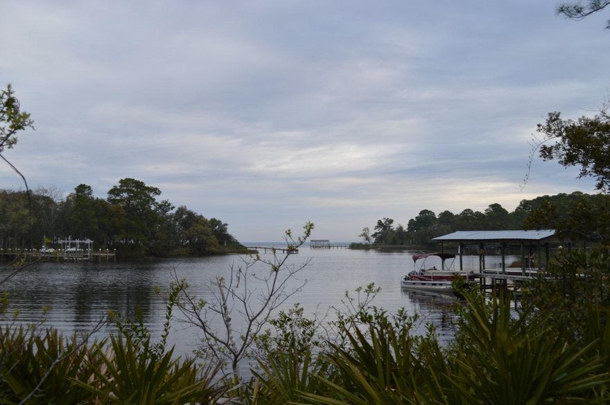 Beautiful deep water bayou front lot. Located on beautiful Hewett Bayou in a pretty private neighborhood. Very close to Sacred Heart Hospital and the shops and restaurants at Grande Boulevard. This lot is close to 1/2 acre with 105' of waterfront. Views of Hewett Bayou as well as the Choctawatchee Bay.Seller is a licensed Realtor in the State of FL.