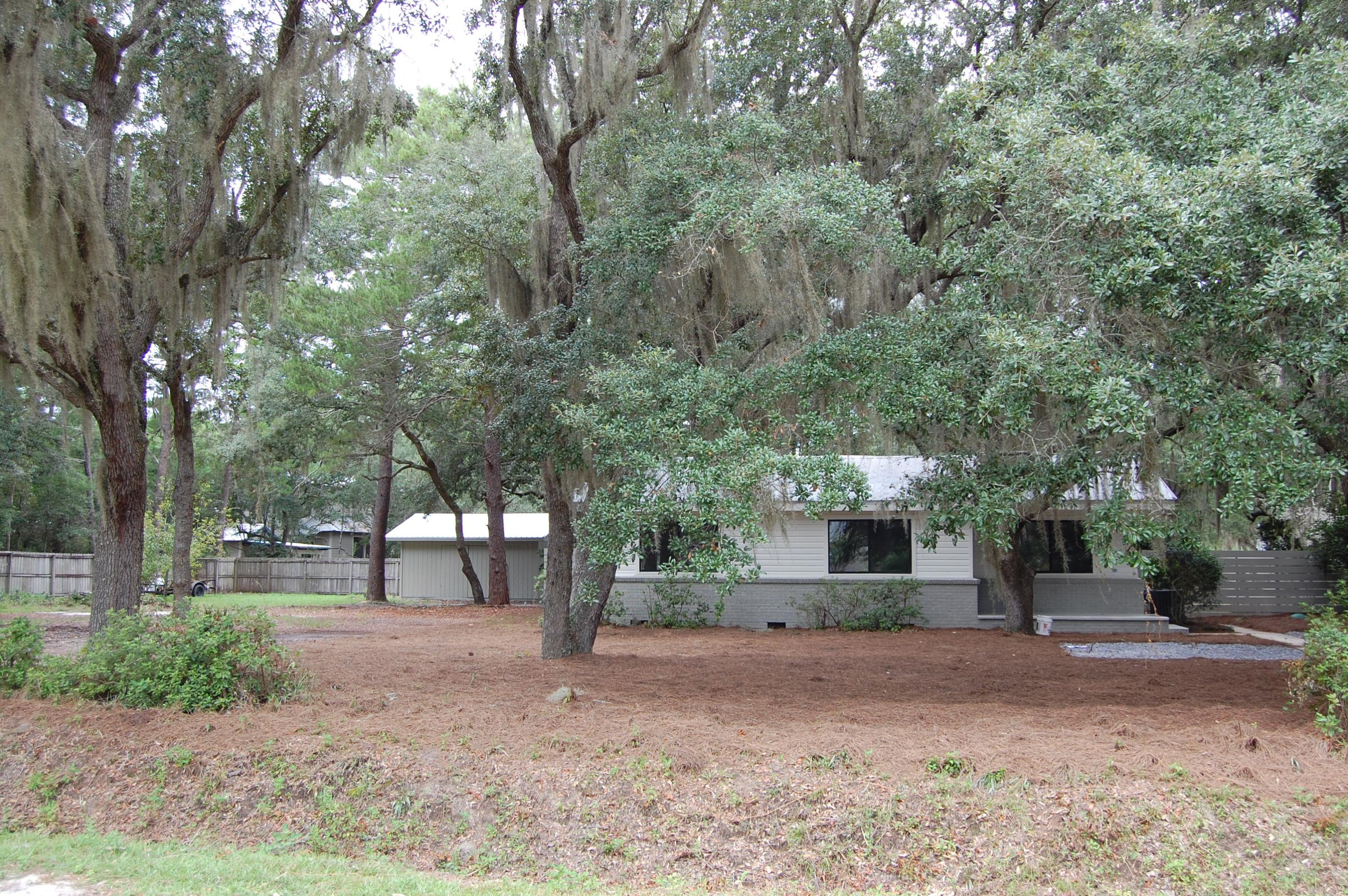 Beautiful buildable lot ready to go. Large oaks, and high elevation make this the perfect setting for your new home! Tap fees paid and site requires little to no prep work. Back yard is already fenced, along with large workshop ready to go. Home next door is for sale at 275K, MLS 712117