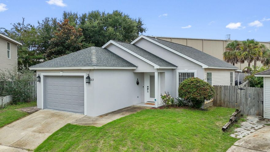 (Dual listed for rent with ONE Family Property Services) *This home qualifies for a 100% financing option through Regions Bank!* Welcome home to this beautifully remodeled home in the heart of Destin with custom finishes inside and out! Pride of ownership shows throughout this beauty complete with a new roof and water heater in 2022. Enter inside and immediately appreciate the open floor plan. The custom kitchen is adorned with real wood cabinets, quartz counters, stainless appliances, and a fantastic kitchen island with additional storage. To the side in the living room there is beautiful custom built cedar cabinetry. You'll love the extra touches like crown molding and shiplap throughout the home along with wood shelving in all the closets. Recessed LED lights are in the kitchen and dining space and you'll love all the windows in the common space allowing for natural lighting. Each bathroom has been updated with a walk in tiled shower and updated vanities. There is an interior laundry room space and a one car garage. Outside you'll step into your new covered back patio that leads into the split backyard that's both conveniently paved and landscaped and provides the perfect outdoor space for cookouts and entertaining. On the side of the home an adorable and shiplapped 8x10 hard wood storage shed provides extra space for all your tools and equipment. Enjoy this lovely home in the heart of Destin and within walking distance to a neighborhood park, and just minutes to restaurants, shopping, and the Emerald Coast's famous white sandy beaches. 