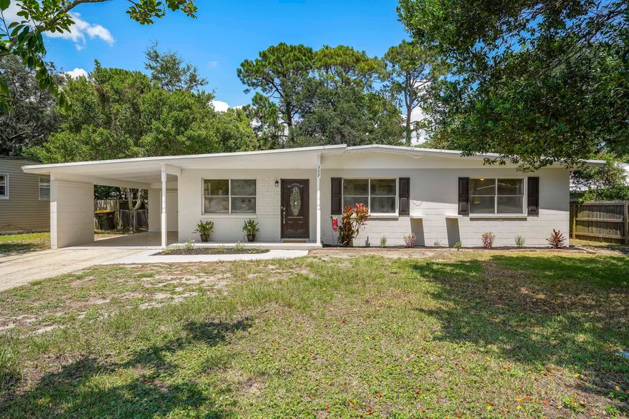 Come see this 4 BR, 2 BA, one-level home located on a quiet street in the highly desired Elliott Point neighborhood! This beautifully renovated brick home boasts an open floor plan, updated kitchen and baths, 2 new gas hot water heaters, and a new HVAC system! You will enjoy the flow and and spaciousness of this home! The kitchen features 42' shaker-style cabinets with European hinges and soft close drawers, elegant granite countertops, modern glass subway tile backsplash, and stainless steel appliances. Both bathrooms have been upgraded with new vanities, tiled shower and bath surround, and updated fixtures.