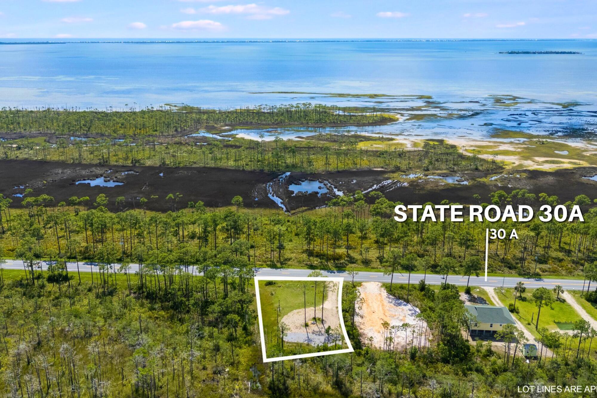 Turnkey RV Lot or Build Site with Bay Views - High-Demand Coastal Location! Here's your chance to own a cleared, half-acre RV-approved lot with beautiful views of St. Joseph Bay and Simmons Bayou. Surrounded on three sides by a protected nature preserve, this property offers lasting privacy and protected views. With water and sewer taps paid and installed, it's fully site-ready--just bring your RV or building plans. Located just minutes from Port St. Joe, Cape San Blas, and Salinas Park, this prime parcel is ideal for a custom home, full-time RV living, or an income-producing vacation rental. Enjoy convenient access to the community boat ramp, Presnell's Bayside RV Resort, St. Joseph Bay Golf Club, and miles of paved nature trails. Highlights: Bay views and spectacular sunsets - Cleared and ready to build - Utilities installed (water and sewer) - RV-approved (not in a restricted zone) - Minutes from beaches, golf, and boating Whether you're ready to build your coastal dream home or secure a flexible RV-friendly site in a high-demand area, this property offers unbeatable value on Florida's Forgotten Coast.