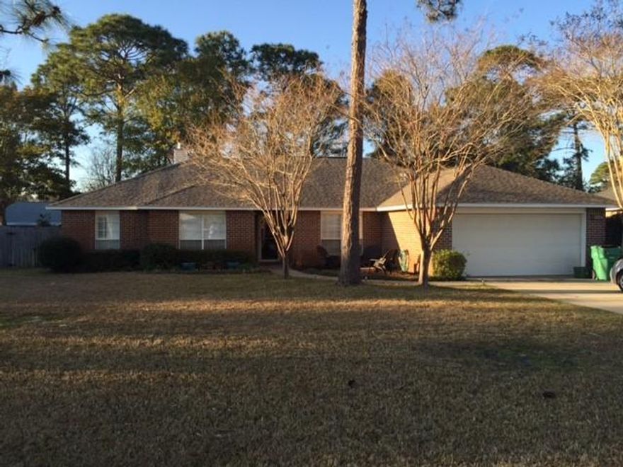 This 2085 Square feet, 3 bedroom/2 bath home boasts a bonus room that can serve as a fourth bedroom, gym, crafts room, children's playroom or anything else you can imagine. Home is located in Bluewater Bay in the desired neighborhood of Raintree Estates! Huge backyard with a playset to fulfill every child's imagination  Slide and swings and even monkey bars to go with two forts and various activity walls. The breeze coming from the bay is nonstop and makes for great afternoons enjoying a cool drink under the beautiful pergola. Or, enjoy a warm fire on those cool winter evenings in the fire pit out front. The star of this home is the kitchen! Gorgeous quartz countertops and beautiful tile backsplash with large island make this perfect for entertaining. Off the kitchen is a for