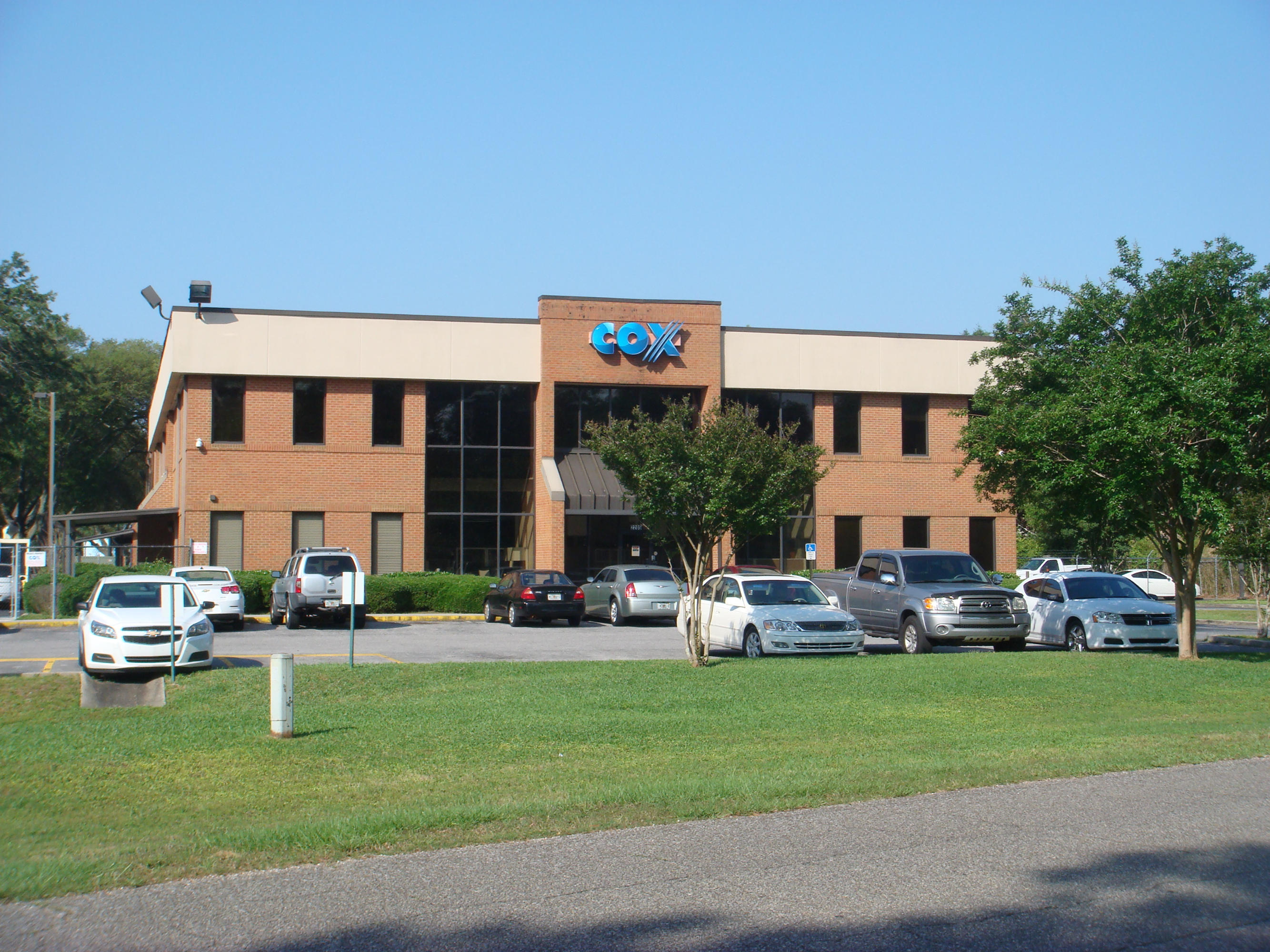 Currently Cox Communications, 2205 La Vista Avenue, is a 32,464 sf building on 4.5 acres of land in Pensacola, Florida. The building houses Execs/Admin offices, and a Call Center. Business is relocating. Some FF&E may be negotiated. Buyer to verify all dimensions.The former Cox Communications building is located in the city's central business core and is within a short drive to Pensacola's downtown historic district. This is a vibrant urban area that has the largest workforce in the city, and includes Cordova Mall, Pensacola State College, Sacred Heart Hospital, many retail businesses and residential neighborhoods. The demographics in the area reflect a stable and mature area.