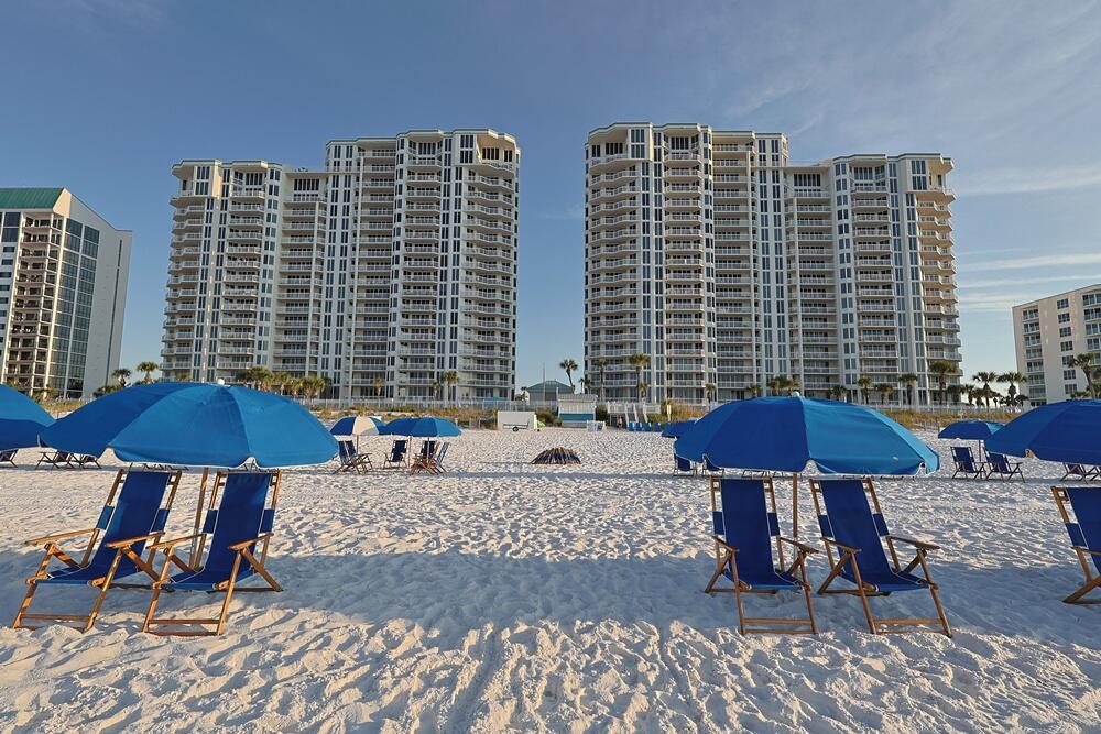 Experience breathtaking Gulf views from this 18th-floor residence in Silver Beach Towers West. Located just one level below the penthouse, this 2-bedroom 2-bath condo features ceilings two feet higher than lower floors. Travertine flooring runs throughout, and both bedrooms plus the living area open to the balcony. The kitchen offers granite counters, stainless appliances and a breakfast bar. The primary suite includes a jetted tub, separate shower and walk-in closet. The guest suite has a private bath. Parking space #106 in the gated garage and storage room #91 are included. Silver Beach Towers offers 600+ feet of beachfront, two Gulf-side pools, hot tubs, tennis courts and grilling area. Central location near shopping, dining and the Destin airport. Schedule your private showing today!